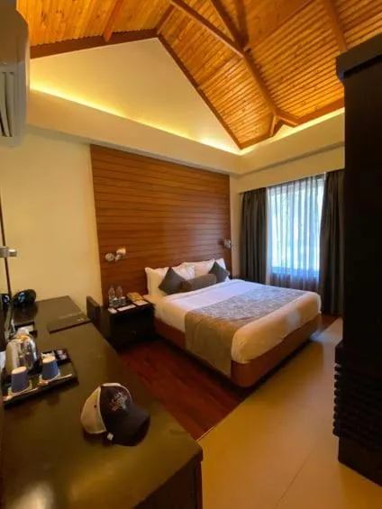 Bed in The Golkonda Resort and Spa