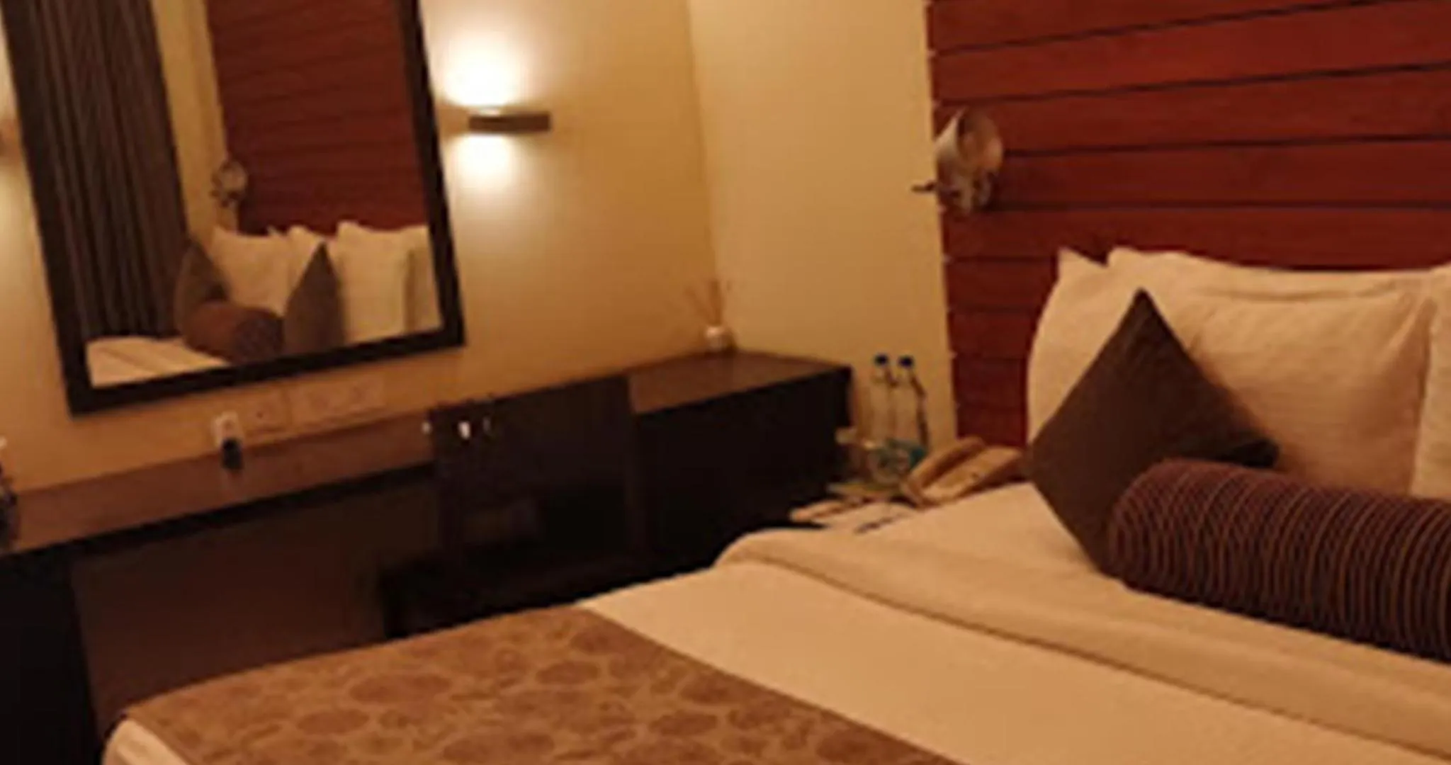 Bed in The Golkonda Resort and Spa