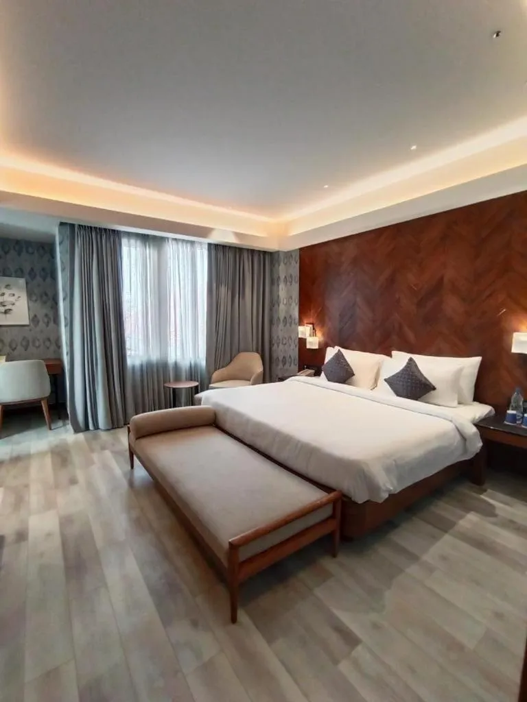 Bed in The Golkonda Resort and Spa