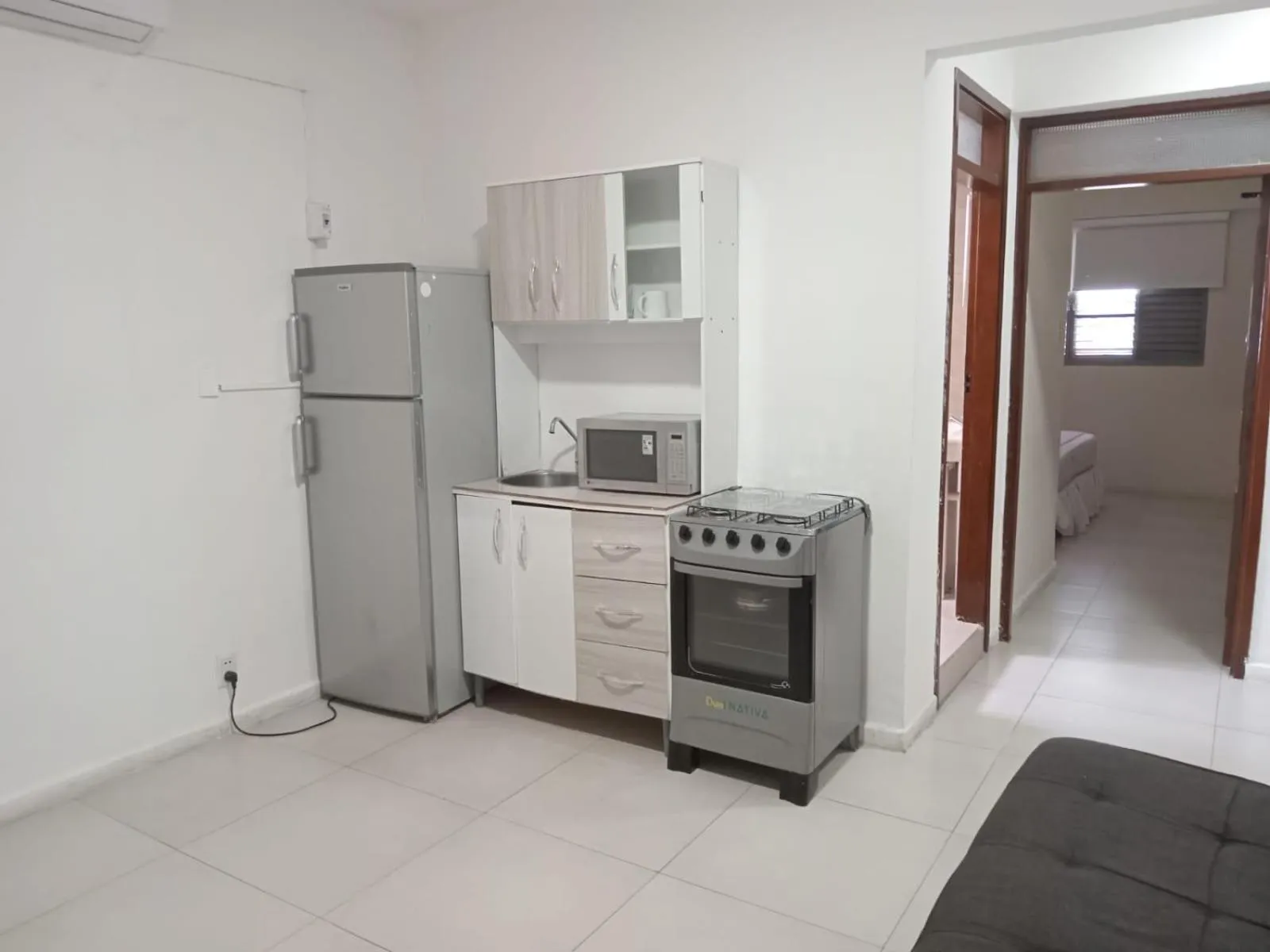 Kitchen or kitchenette in La Siesta Hotel