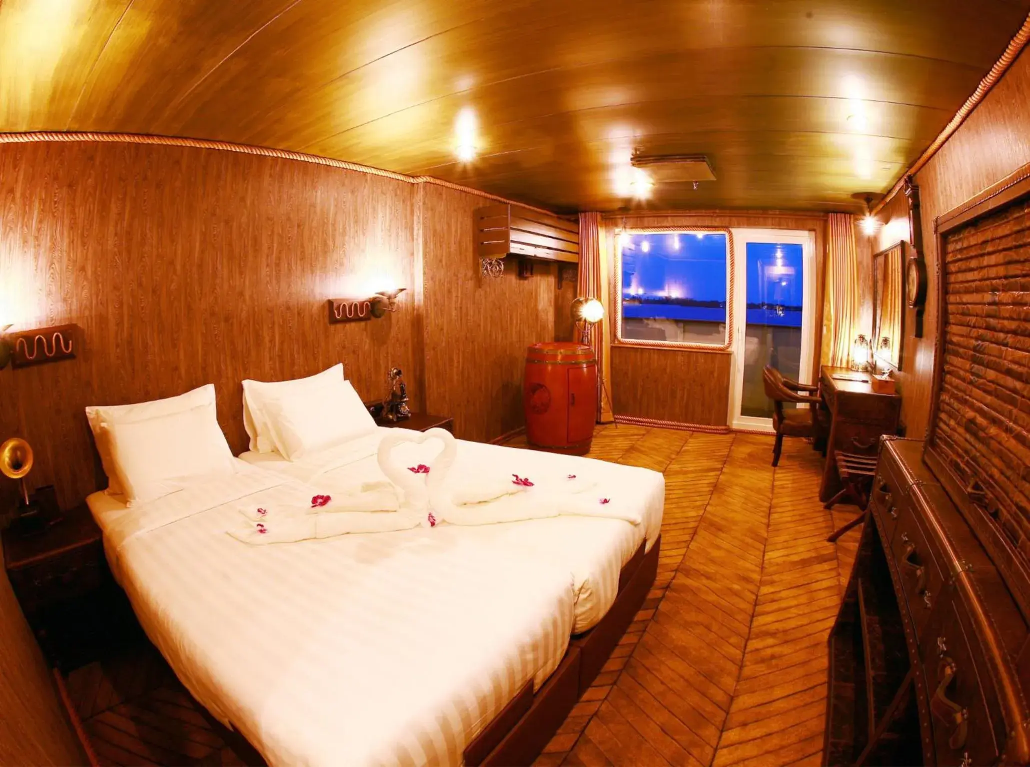 Deluxe Room With Balcony River View in Vintage Luxury Yacht Hotel Deluxe Room With Balcony River View in Vintage Luxury Yacht Hotel