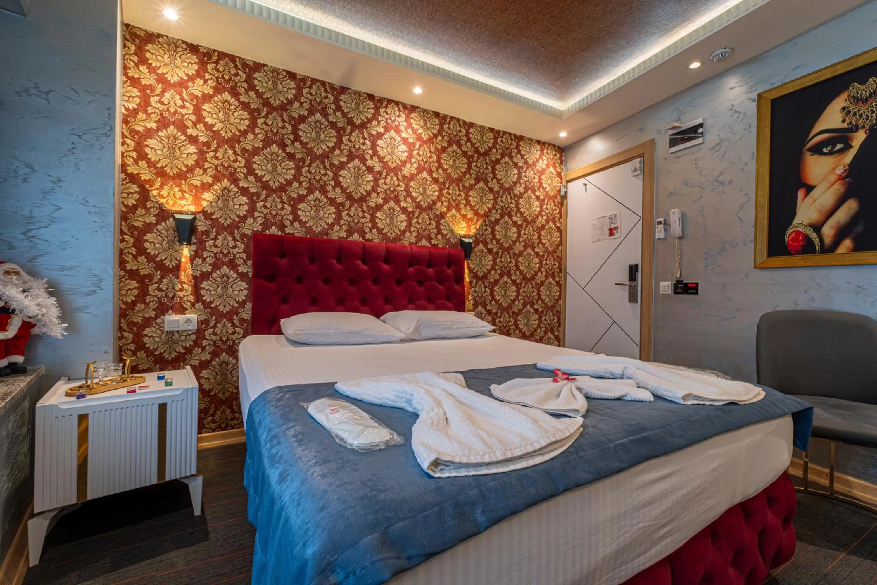 Bed in Stay Suite Hotel