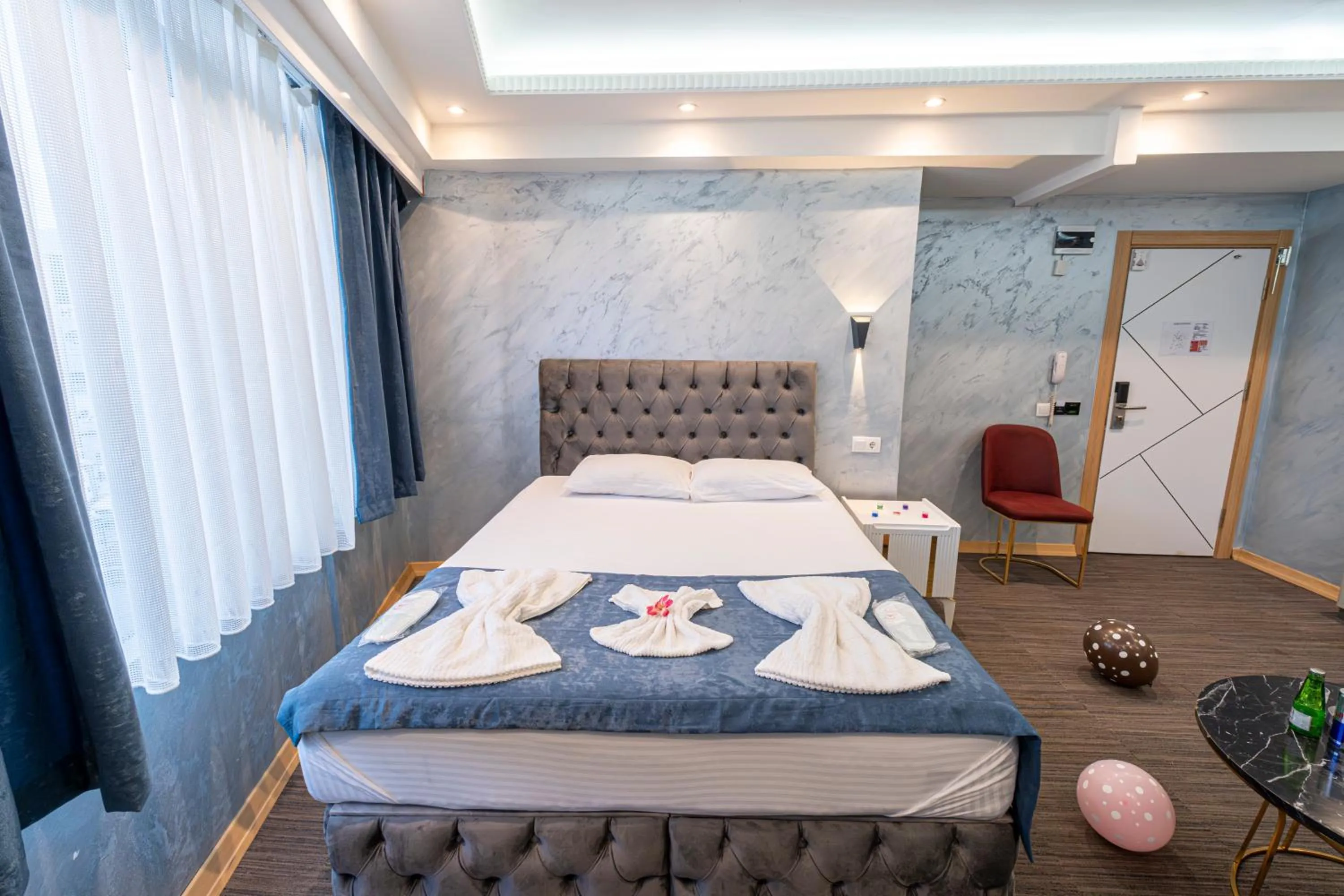 Bed in Stay Suite Hotel