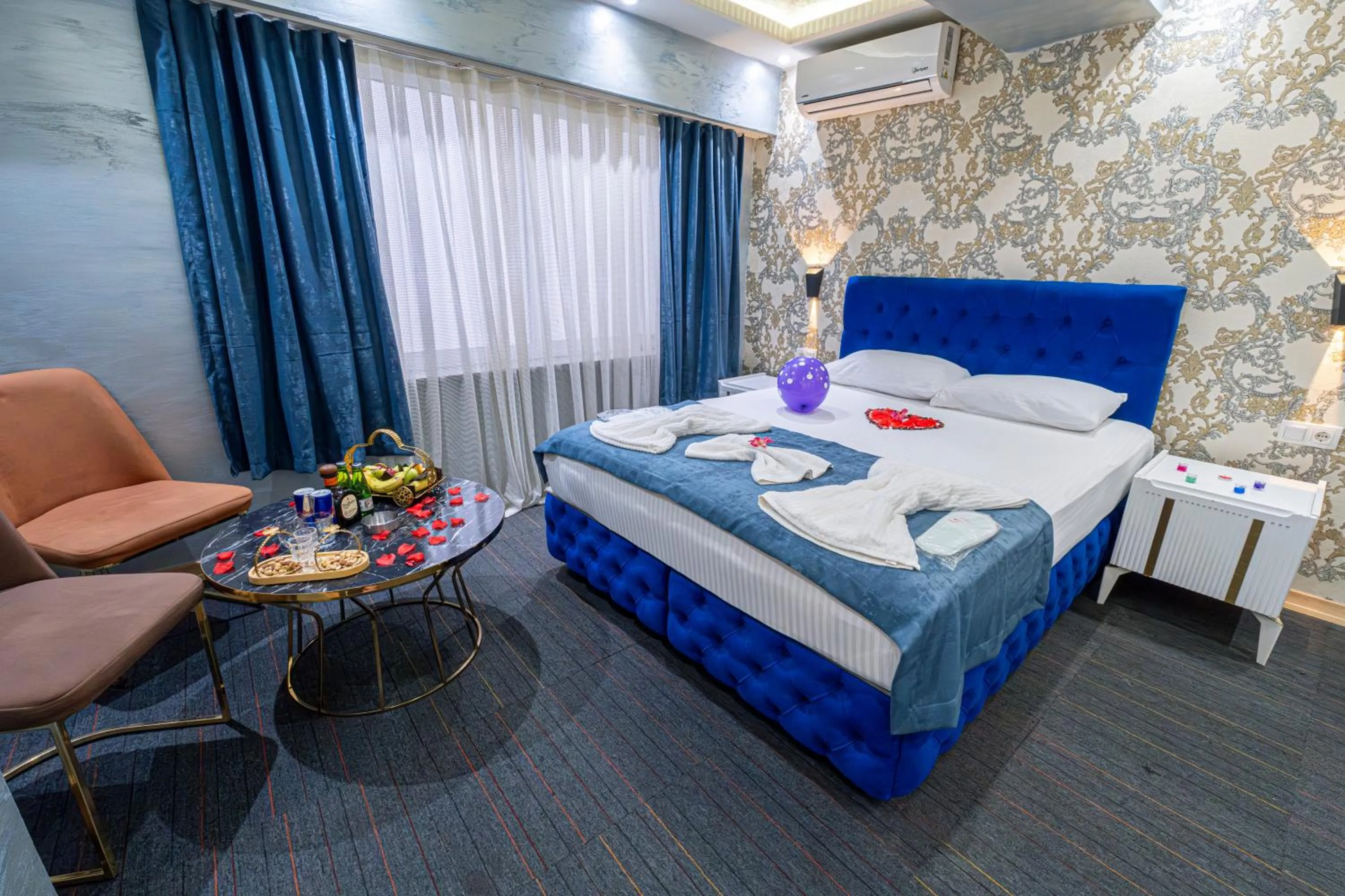 Bed in Stay Suite Hotel