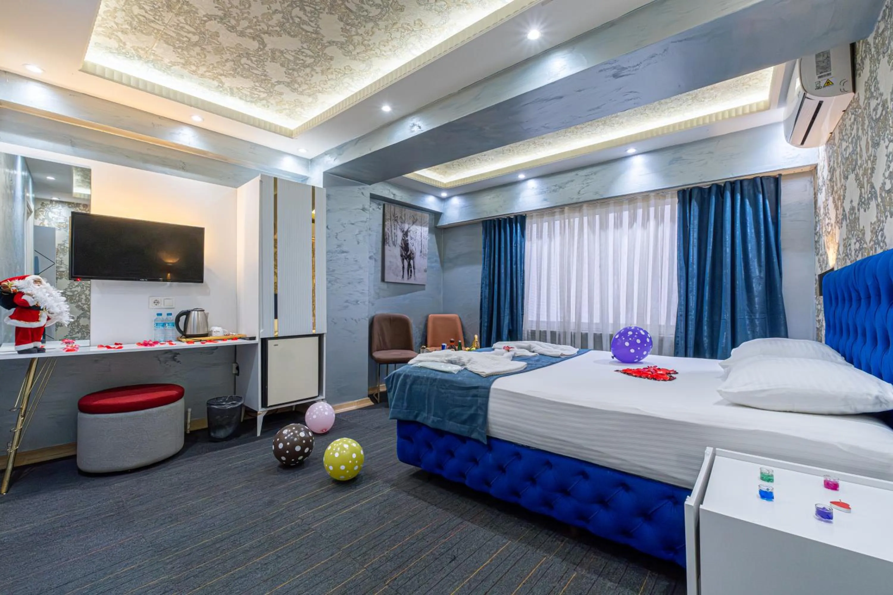 Bed in Stay Suite Hotel