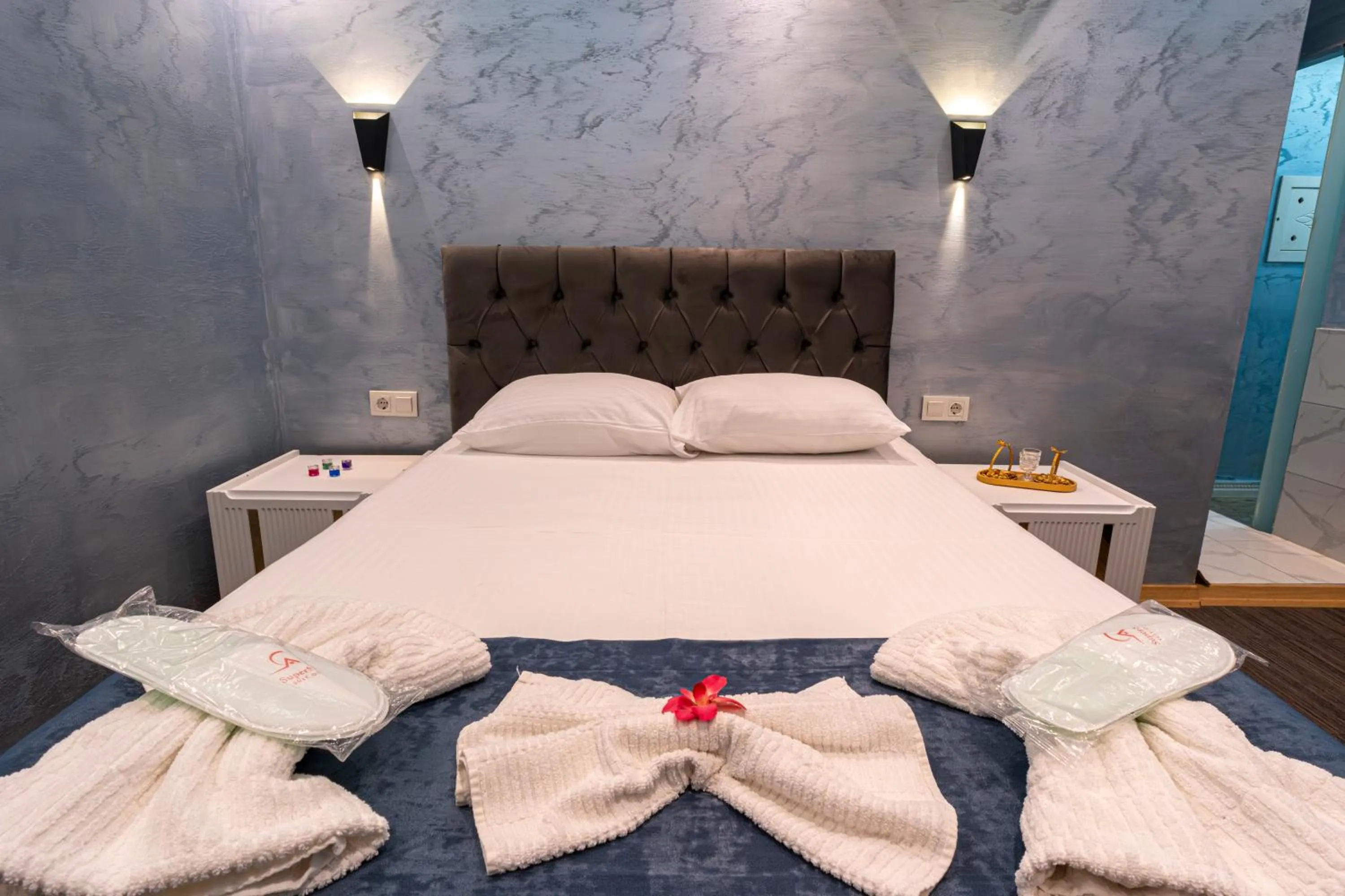 Bed in Stay Suite Hotel