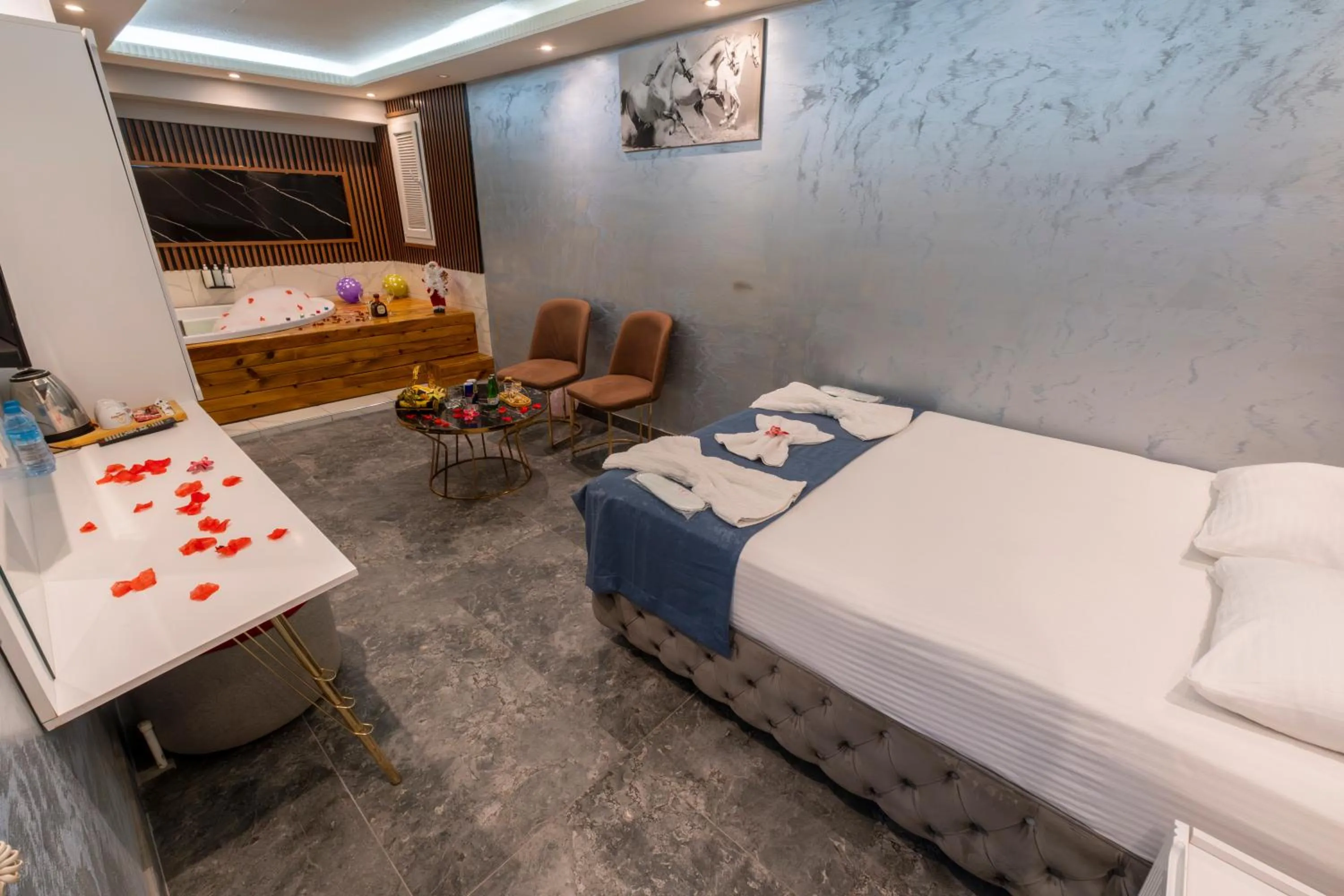 Bed in Stay Suite Hotel