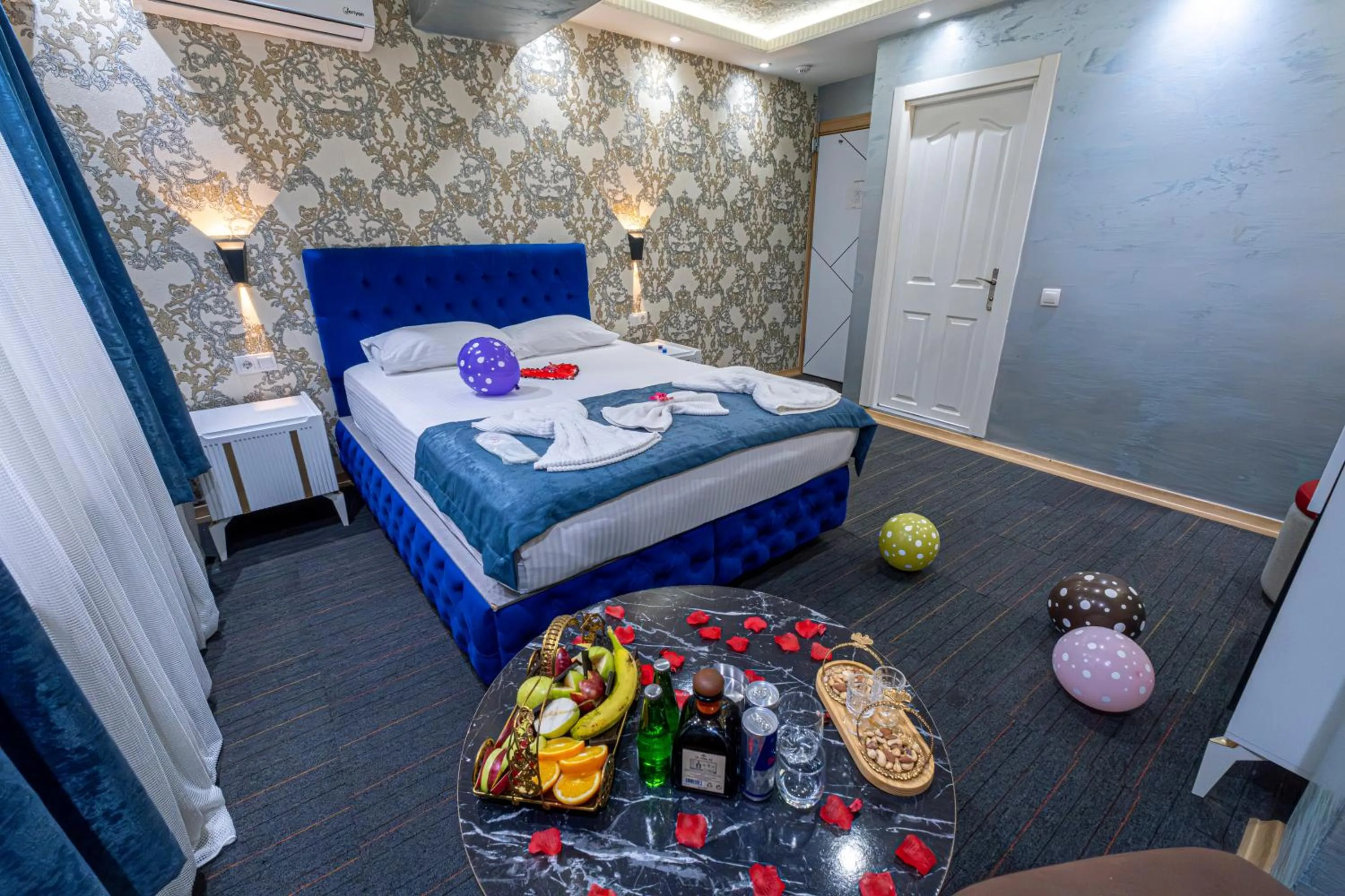 Bed in Stay Suite Hotel