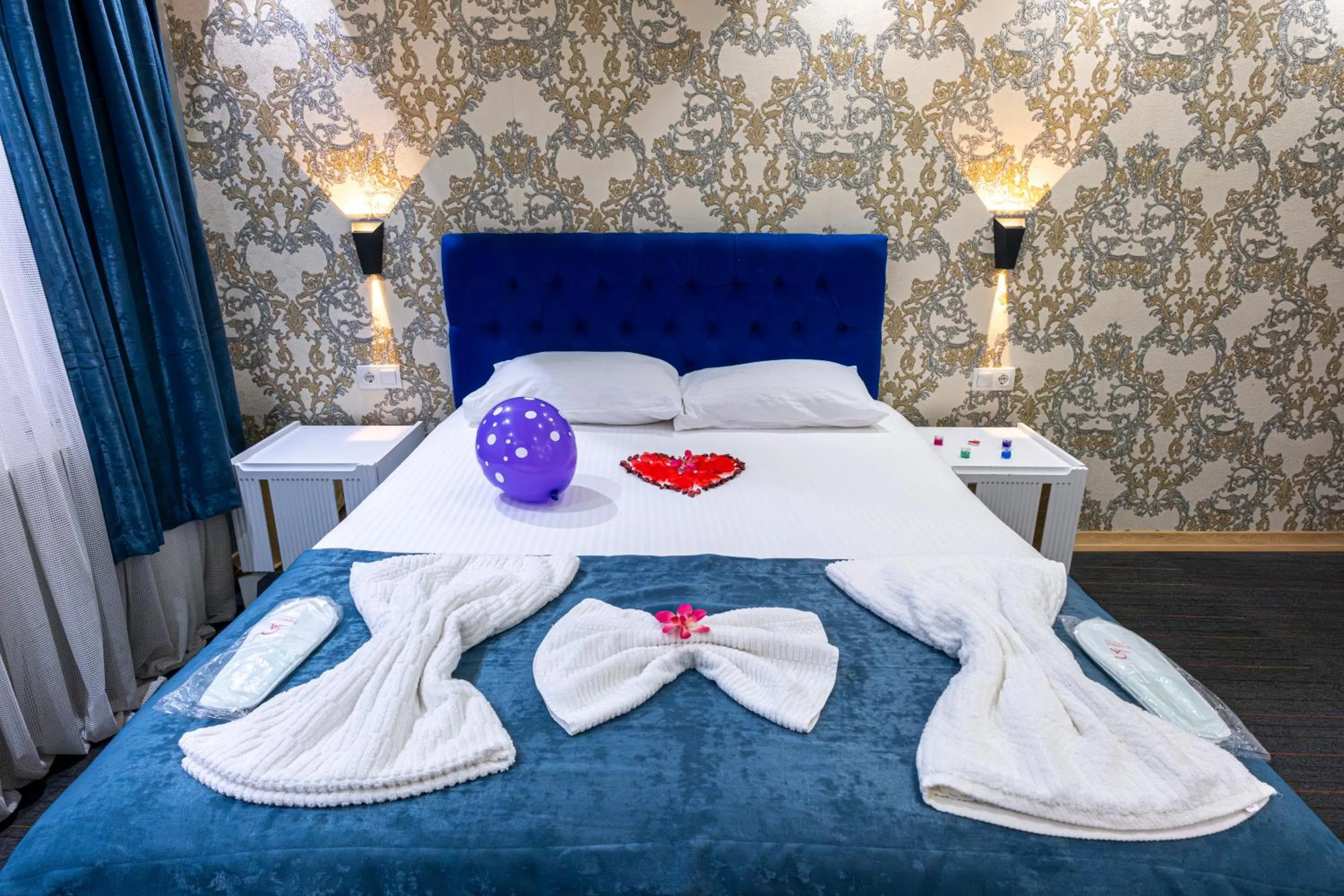 Bed in Stay Suite Hotel