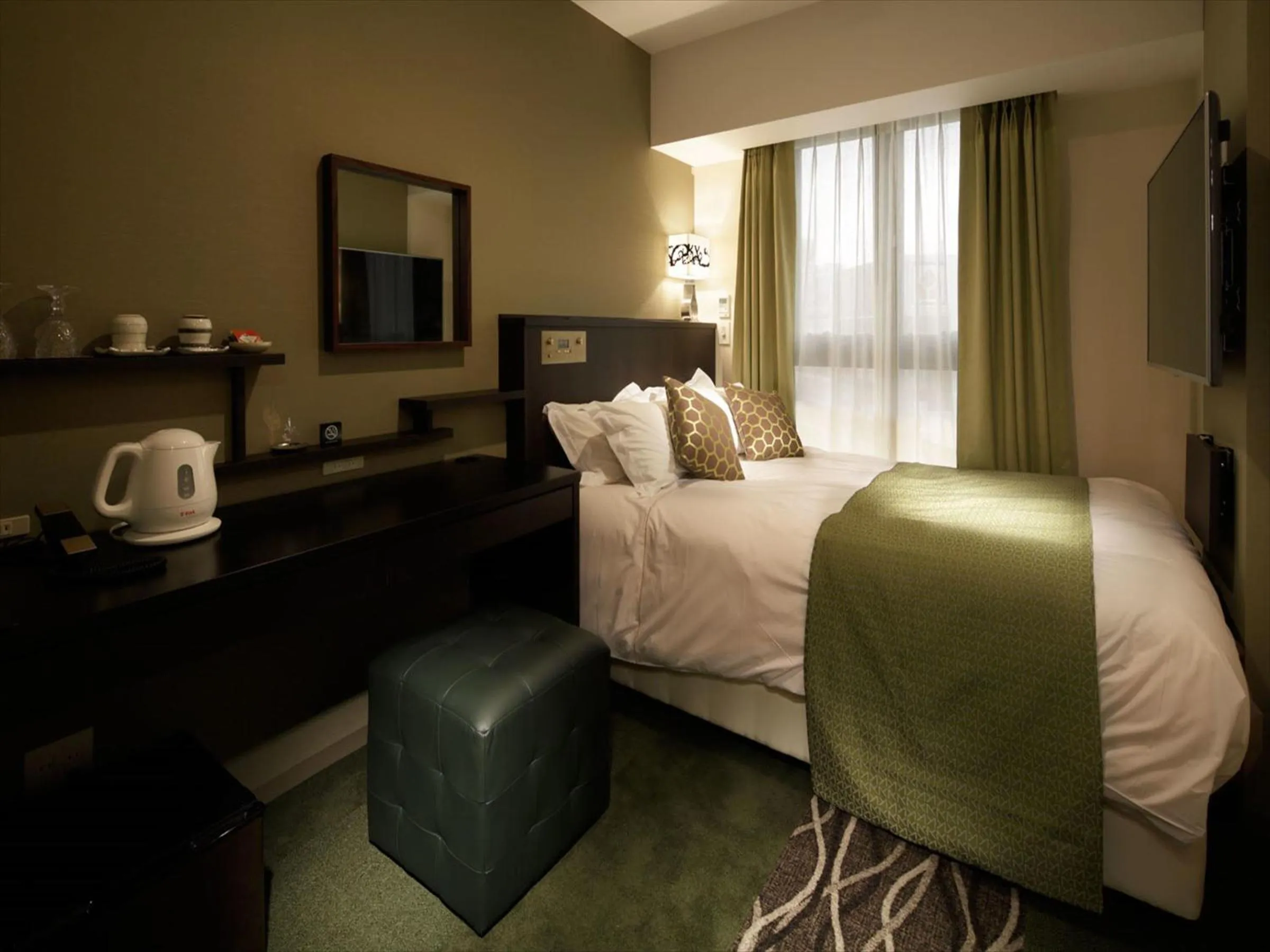 Photo of the whole room, Bed in Centurion Hotel Ikebukuro Station