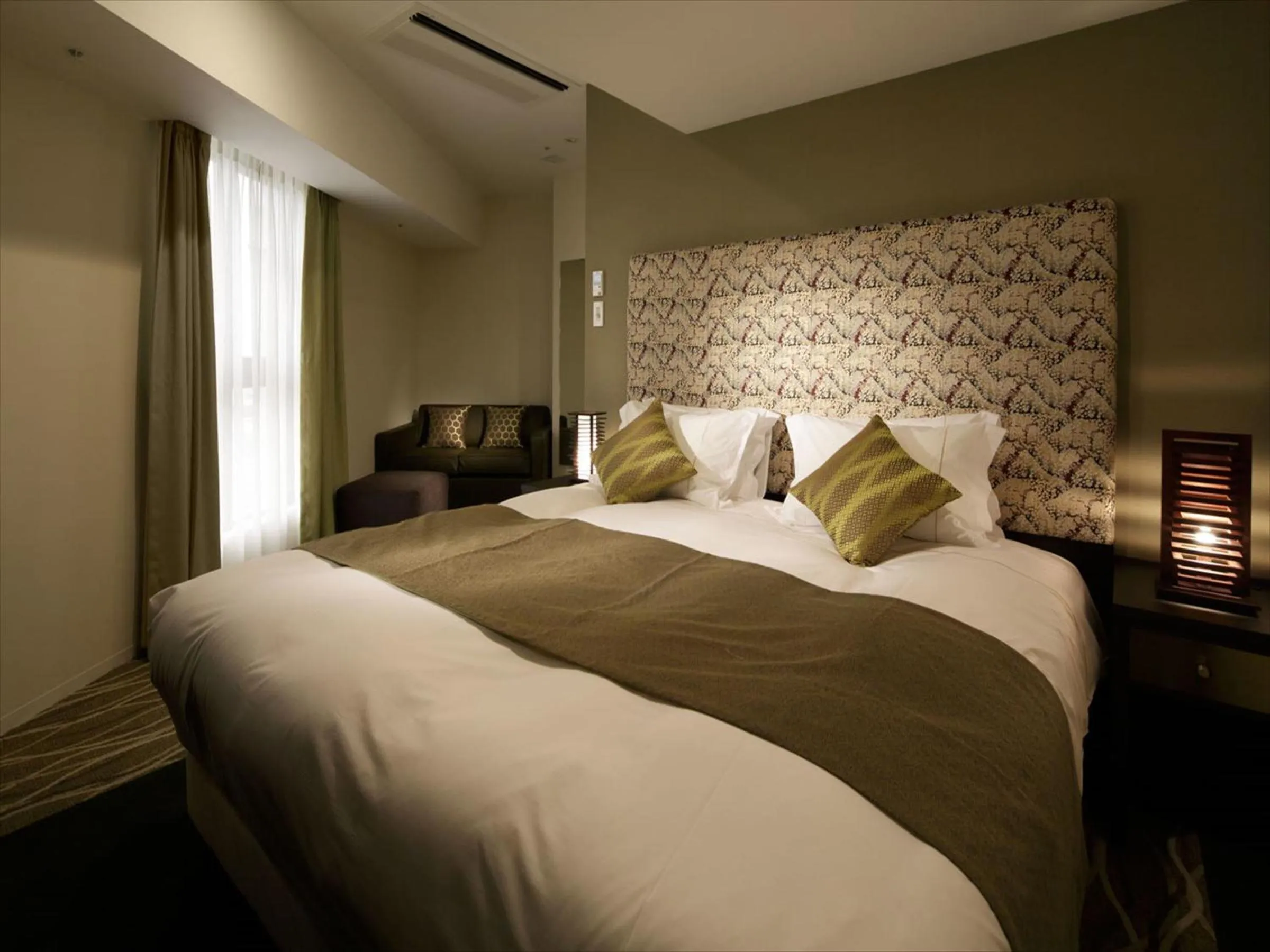 Photo of the whole room, Bed in Centurion Hotel Ikebukuro Station