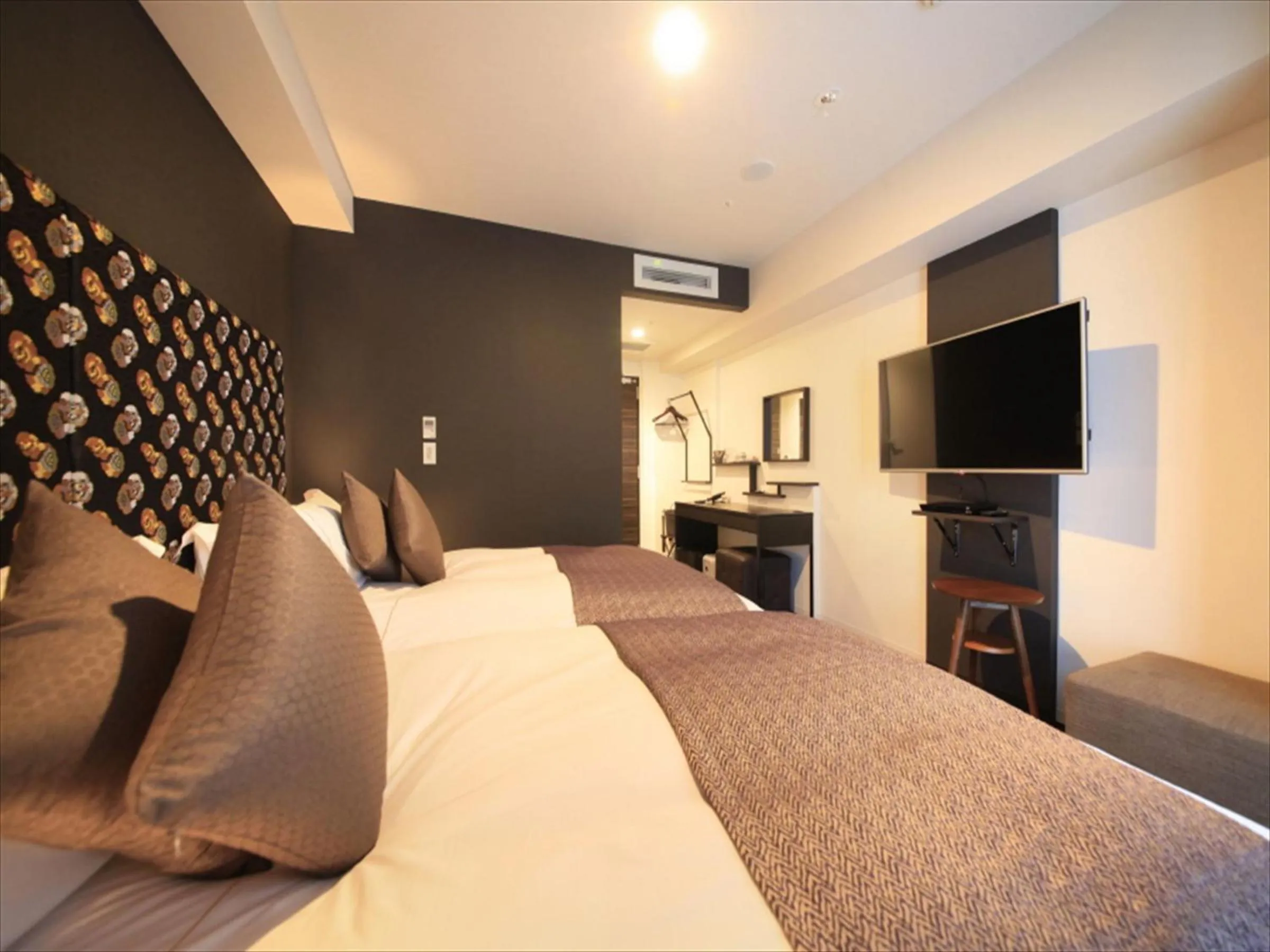 Photo of the whole room, Bed in Centurion Hotel Ikebukuro Station