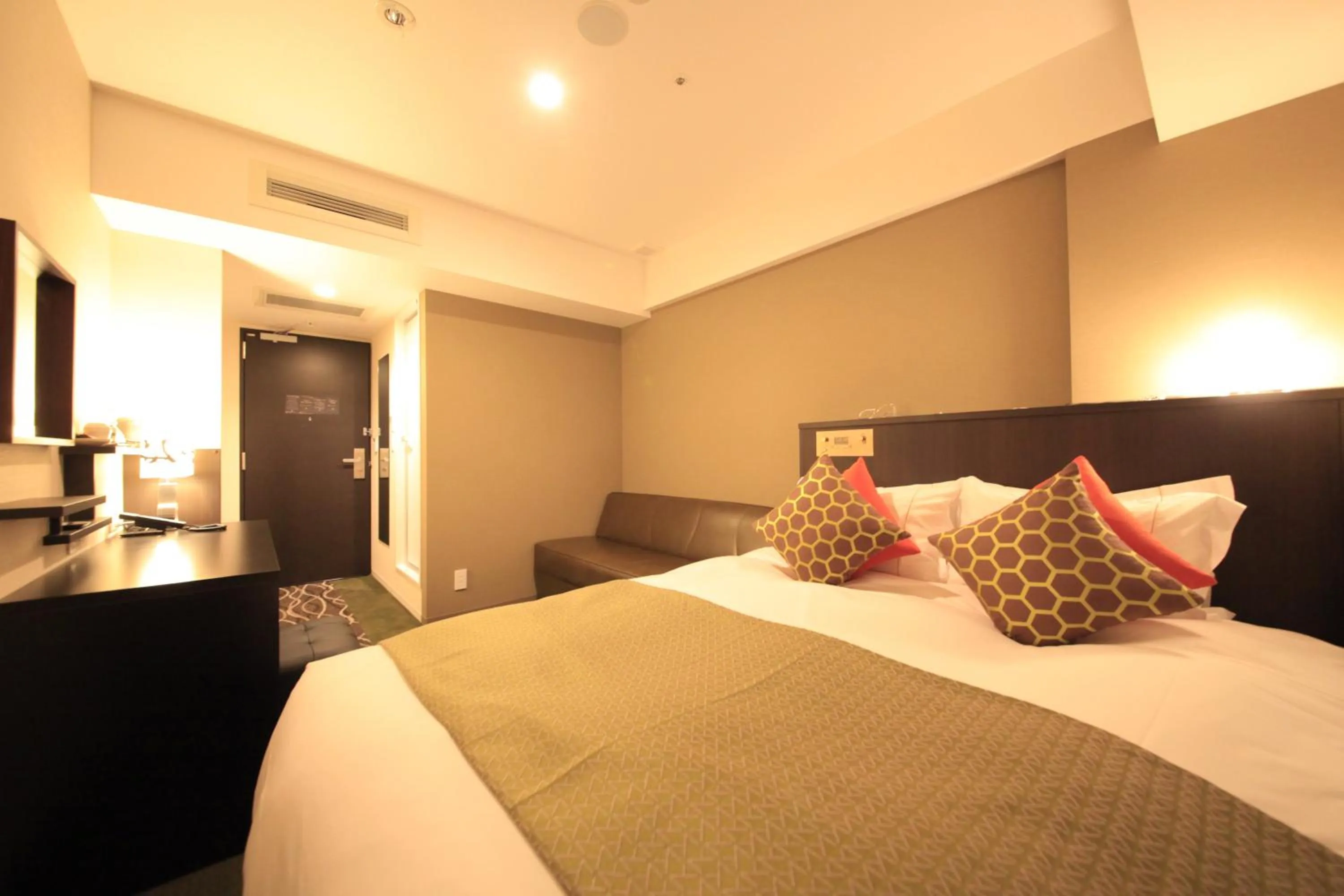 Photo of the whole room, Bed in Centurion Hotel Ikebukuro Station