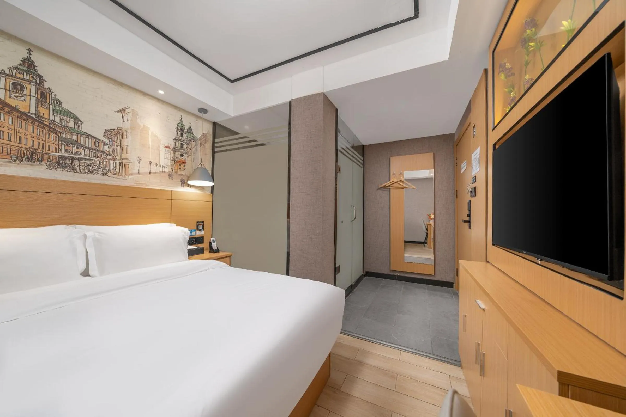 Bed in Yi Nuo Hotel Guangzhou