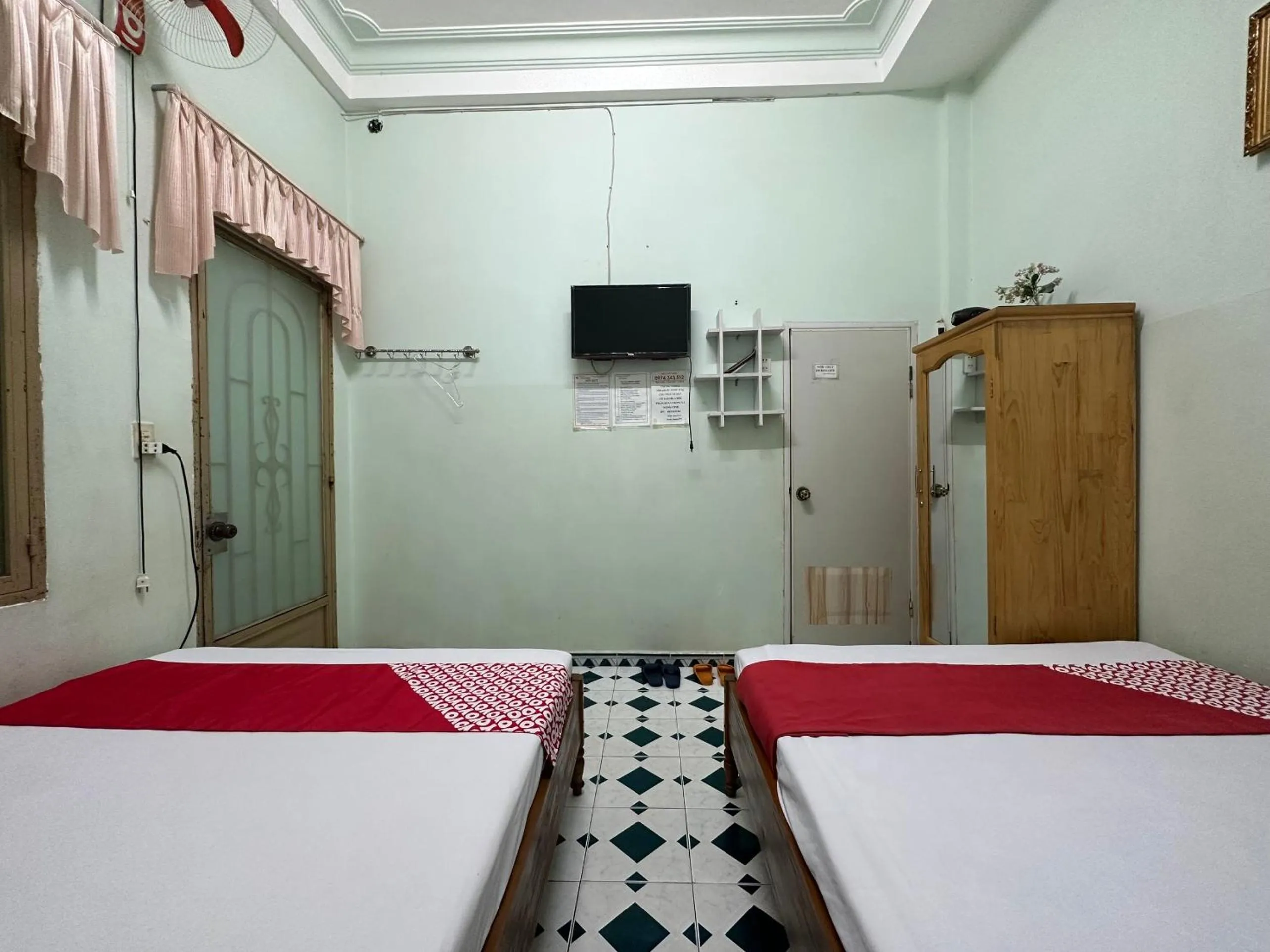 Bedroom, Bed in OYO 1206 Toan Thang Homestay