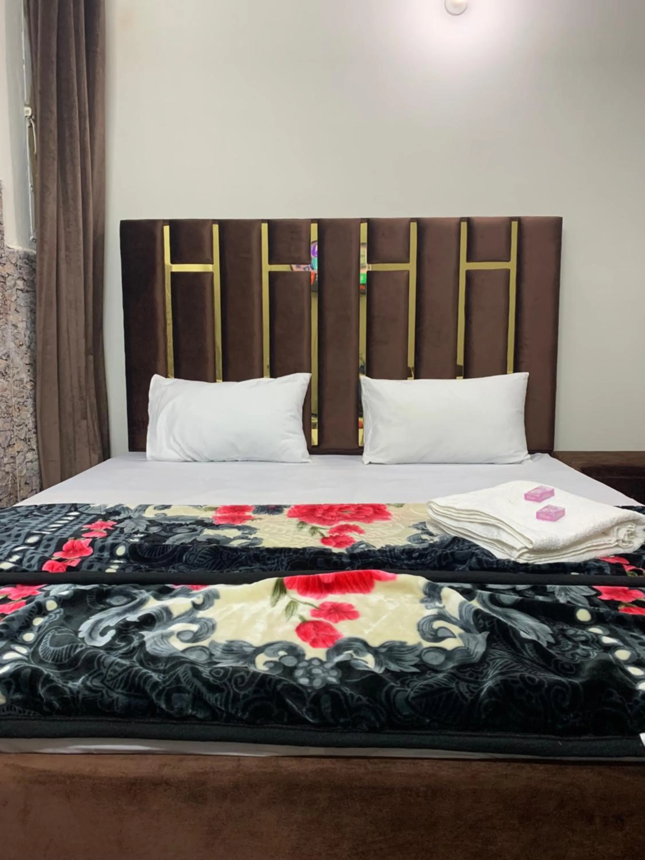 Bed in Eden Plus Executive Hotel