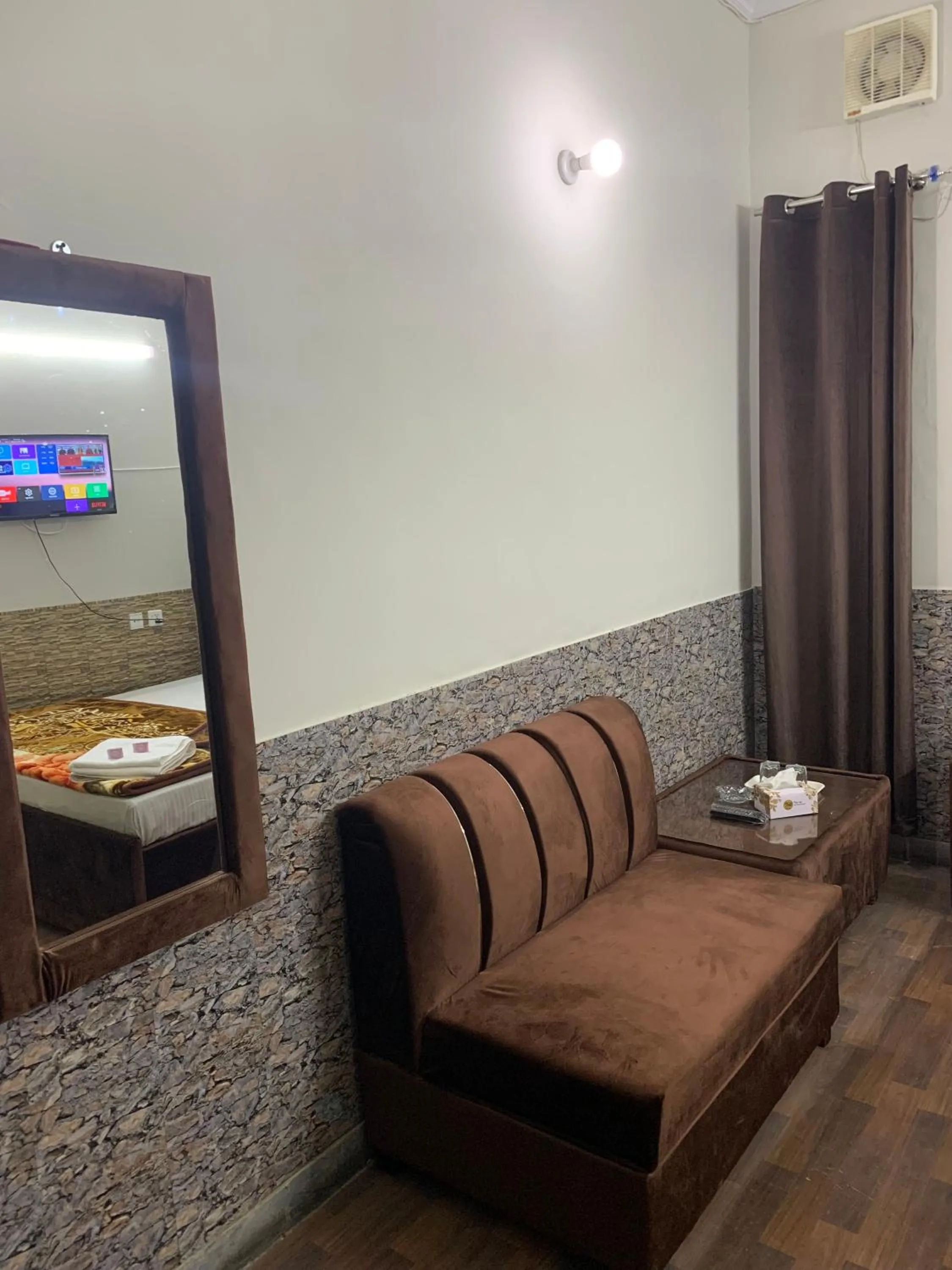 Seating area, Bed in Eden Plus Executive Hotel