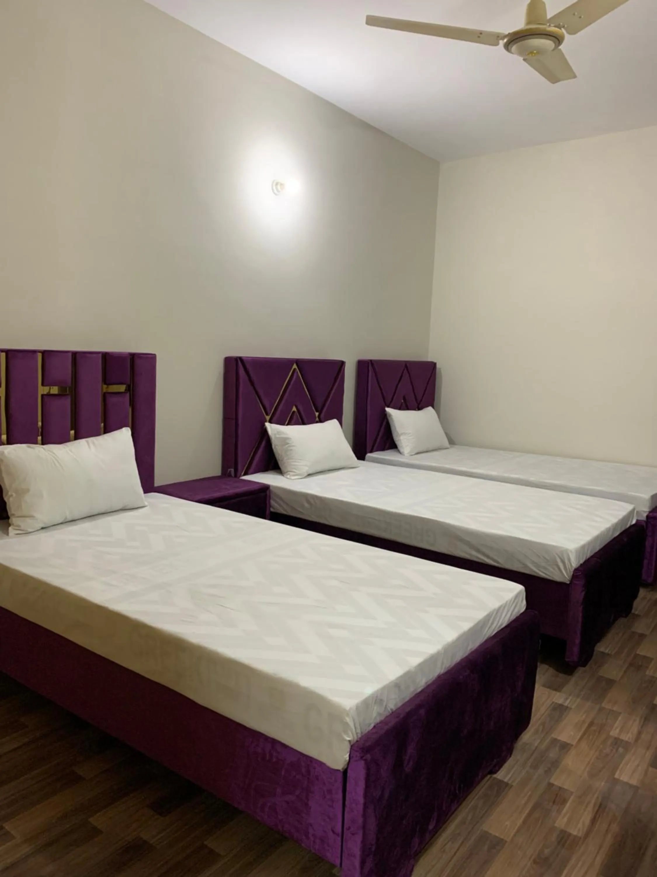 Bed in Eden Plus Executive Hotel