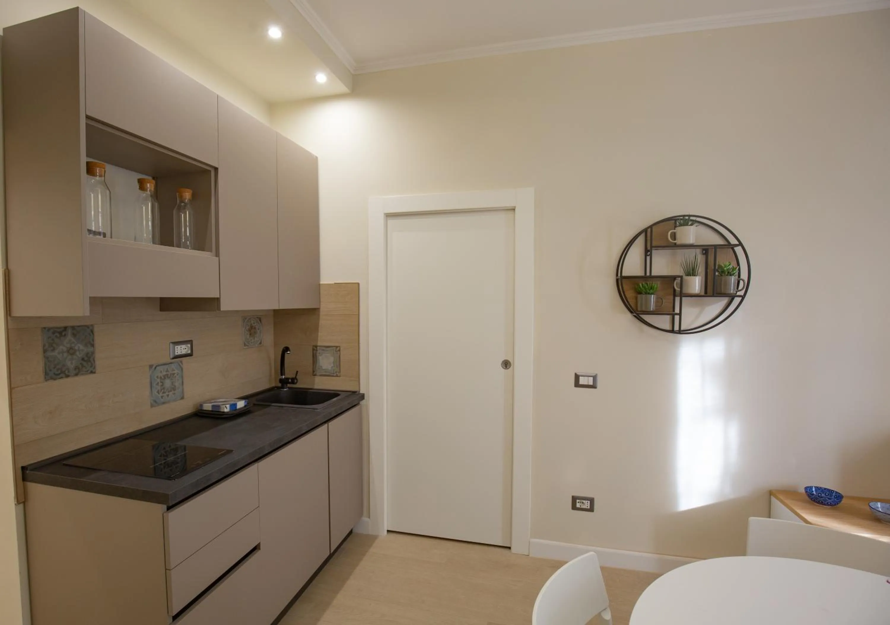 Kitchen or kitchenette in Colosseum Maison