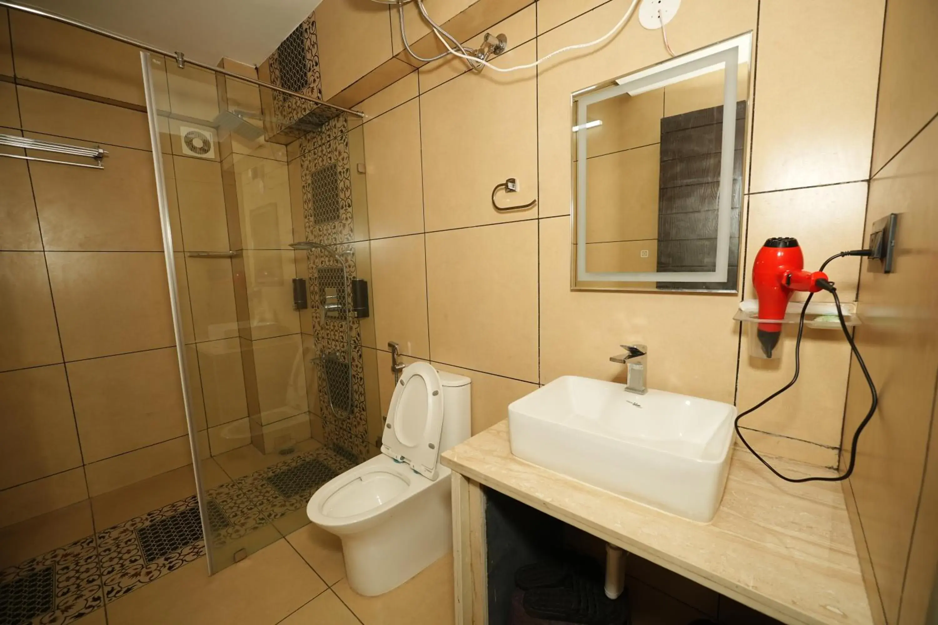 Bathroom in Saikiran Hotel Bathroom in Saikiran Hotel