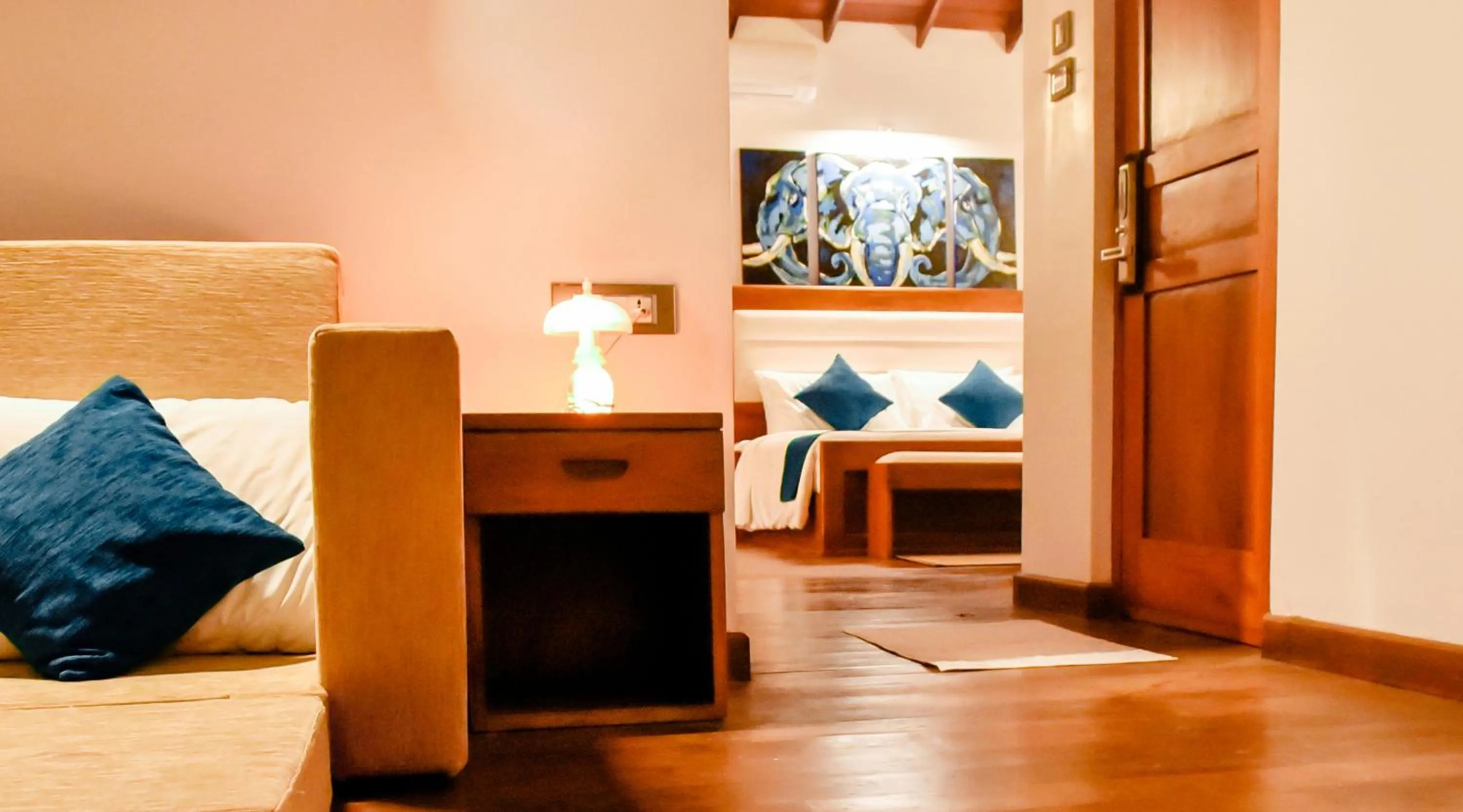 Seating area, Bed in Wisdom Boutique Resort