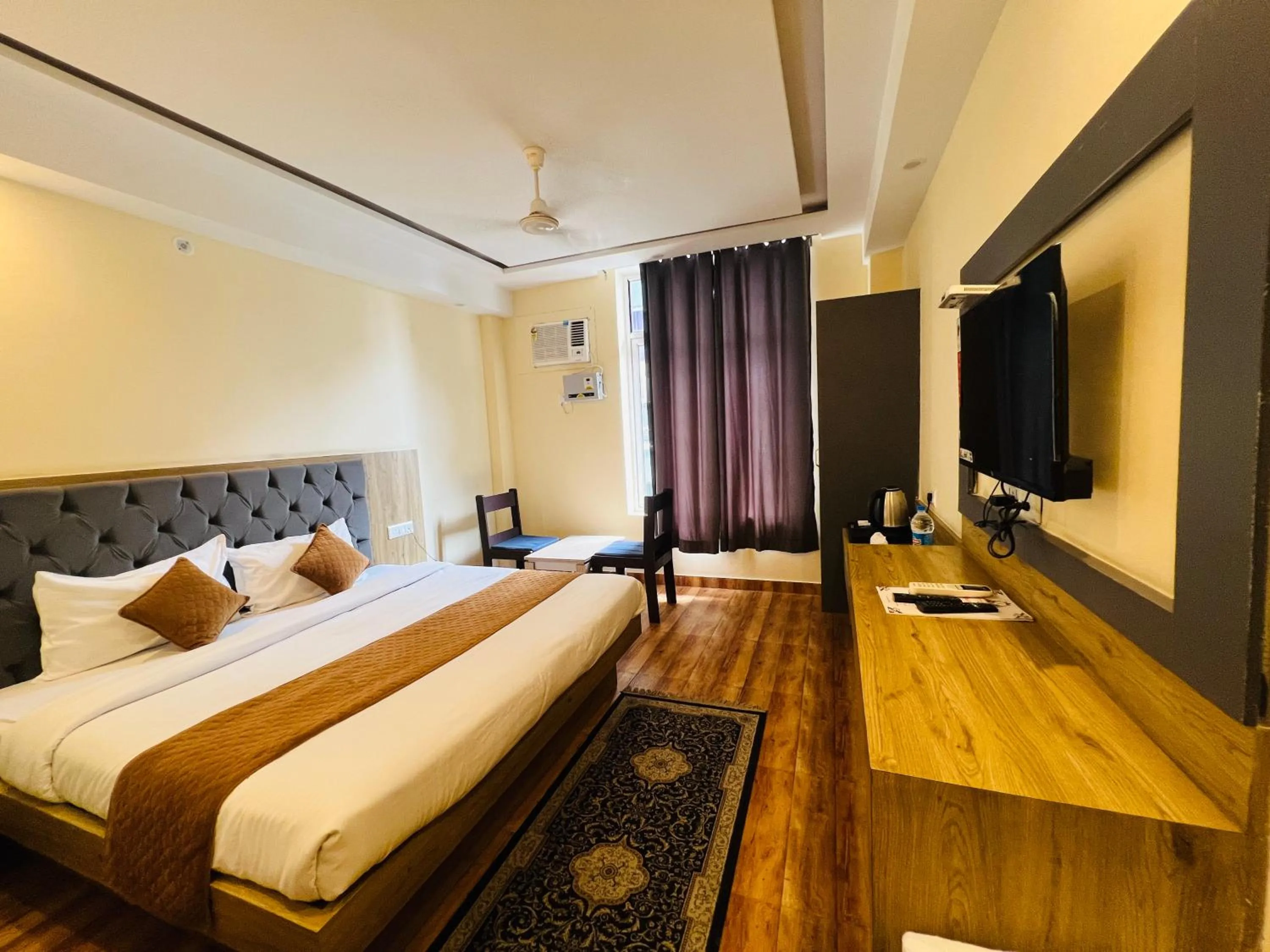 Bed in The Fragrance Hotel