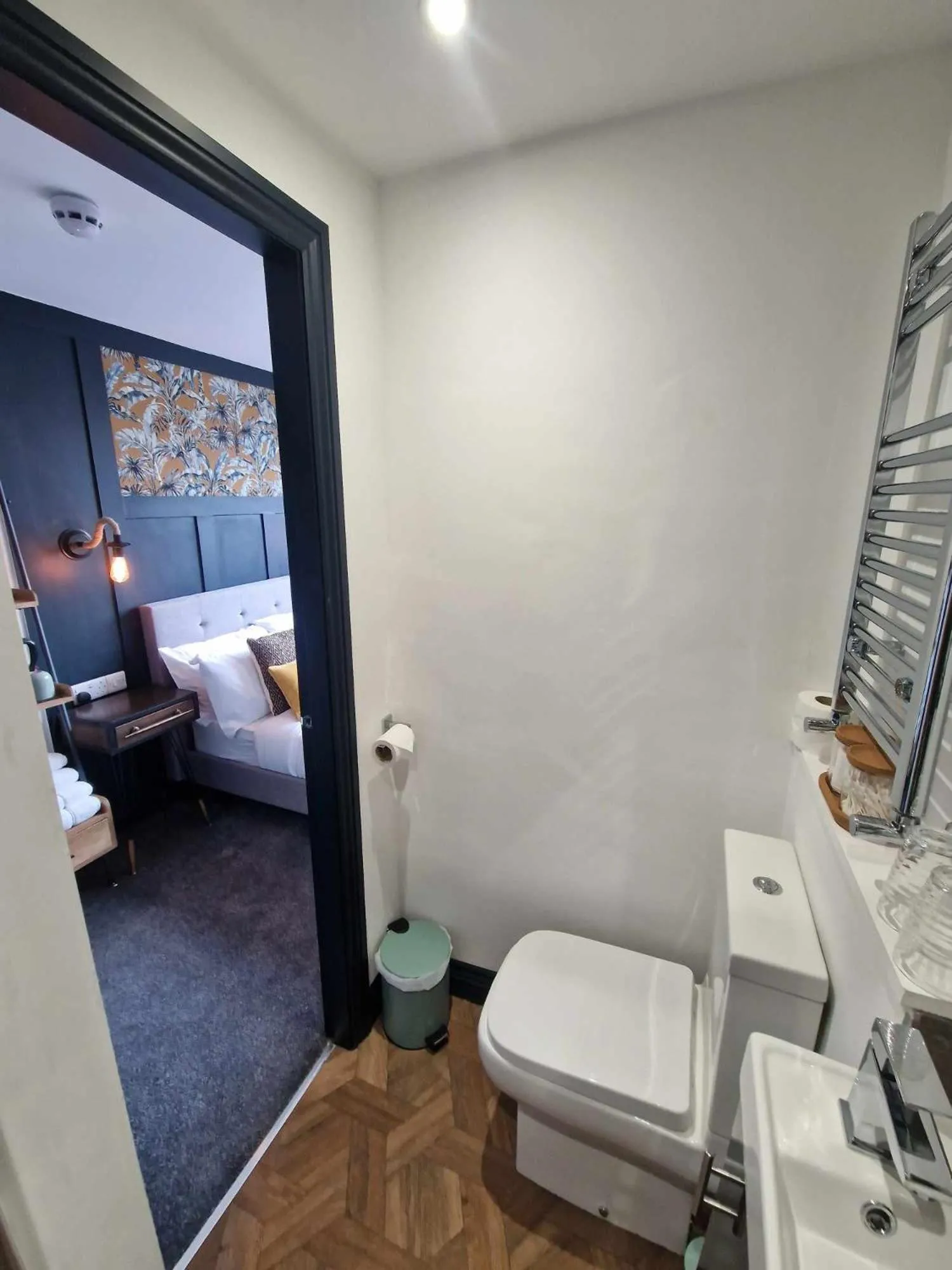 Toilet, Bed in The Coastal Hideaway