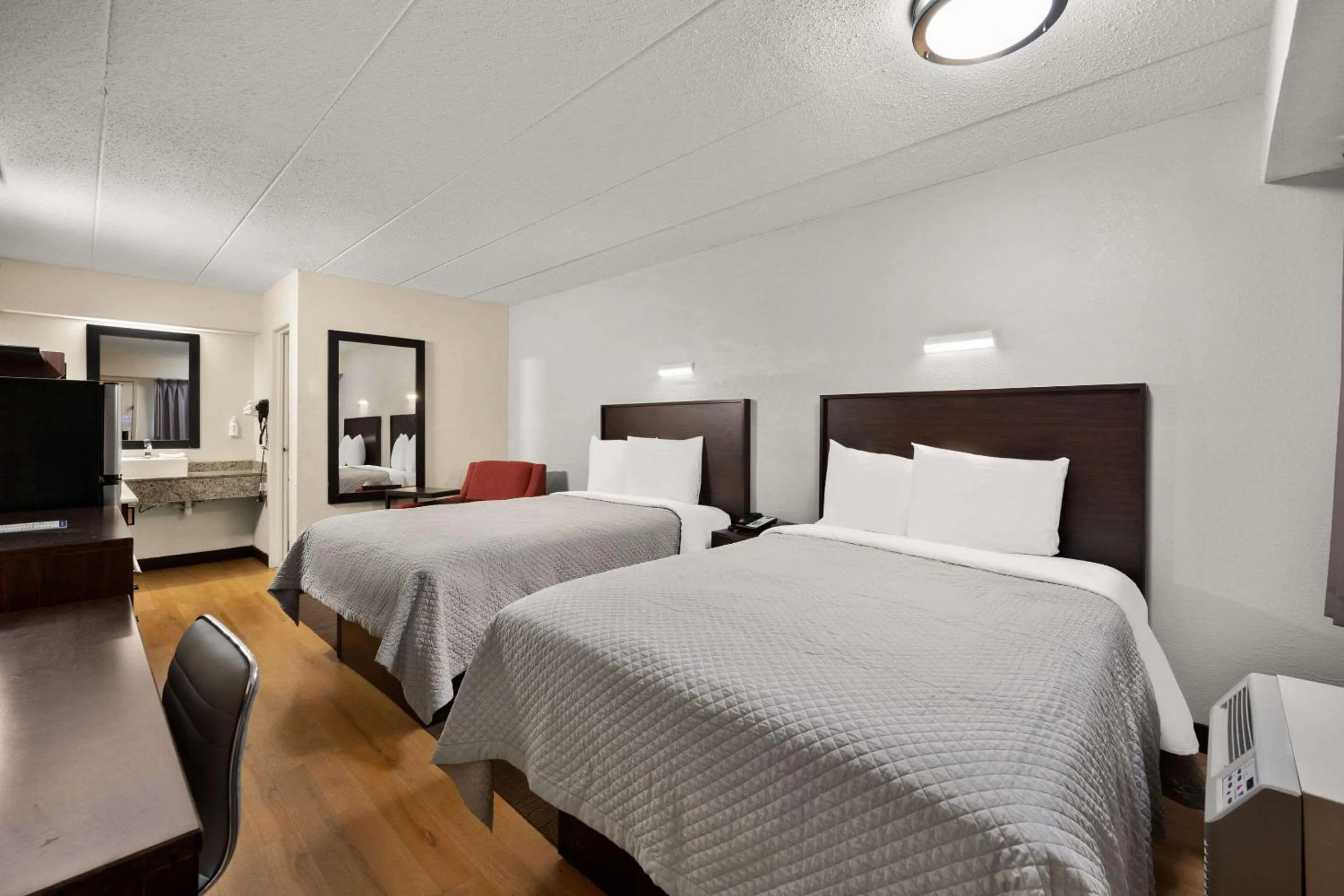 Bedroom, Bed in Suburban Studios Peoria