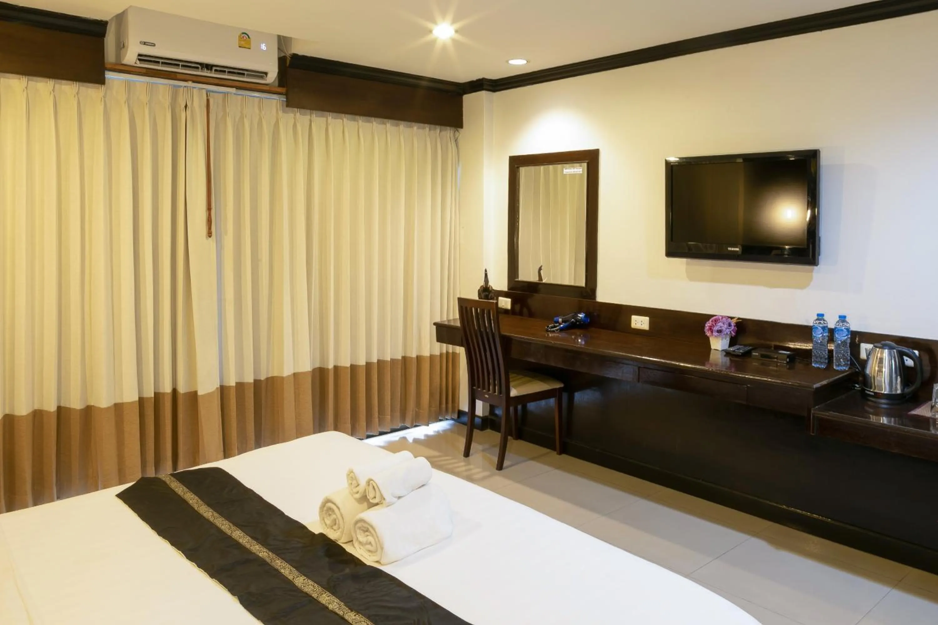 Bed in Best Venue Hotel