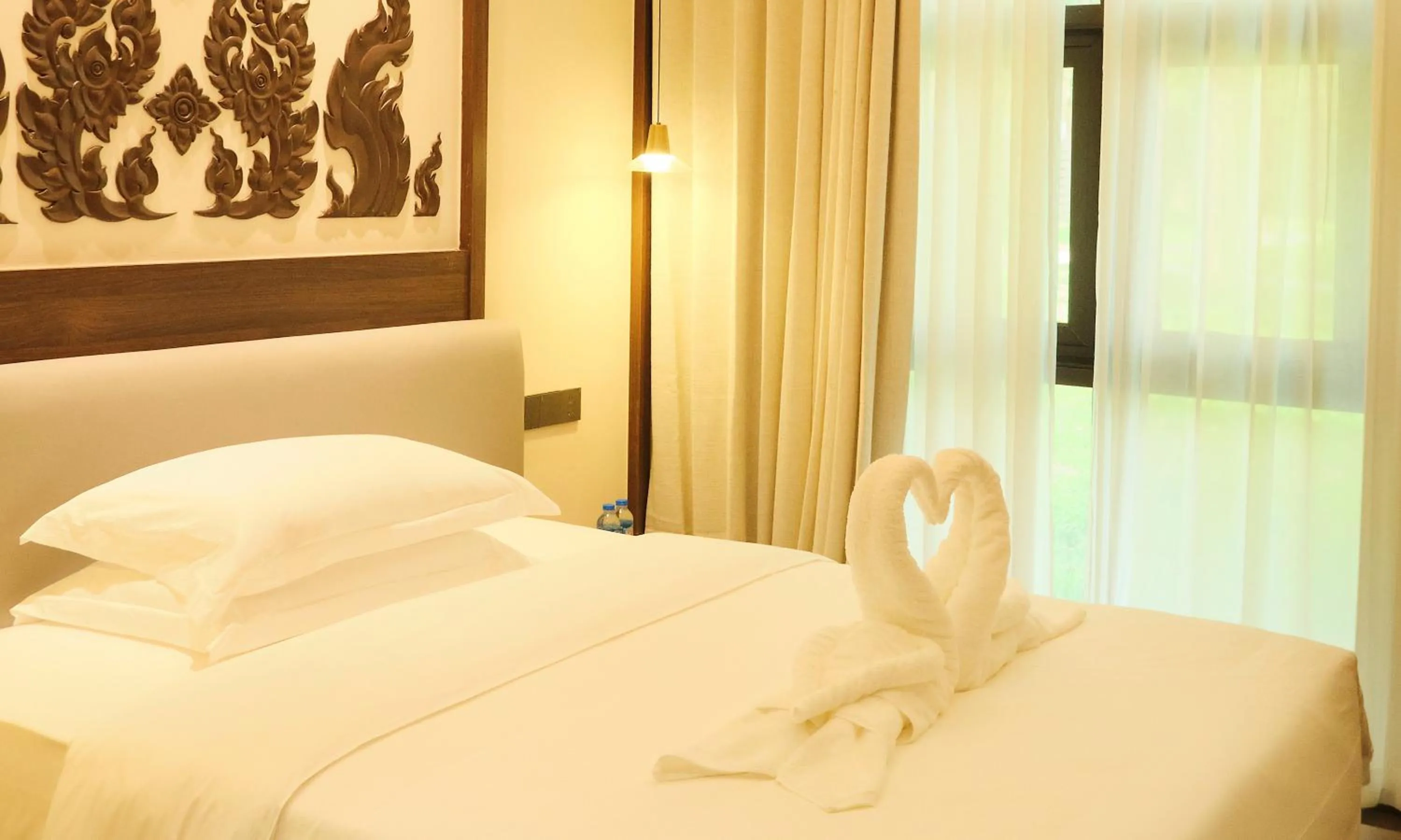 Bed in MonMonBoutique Hotel