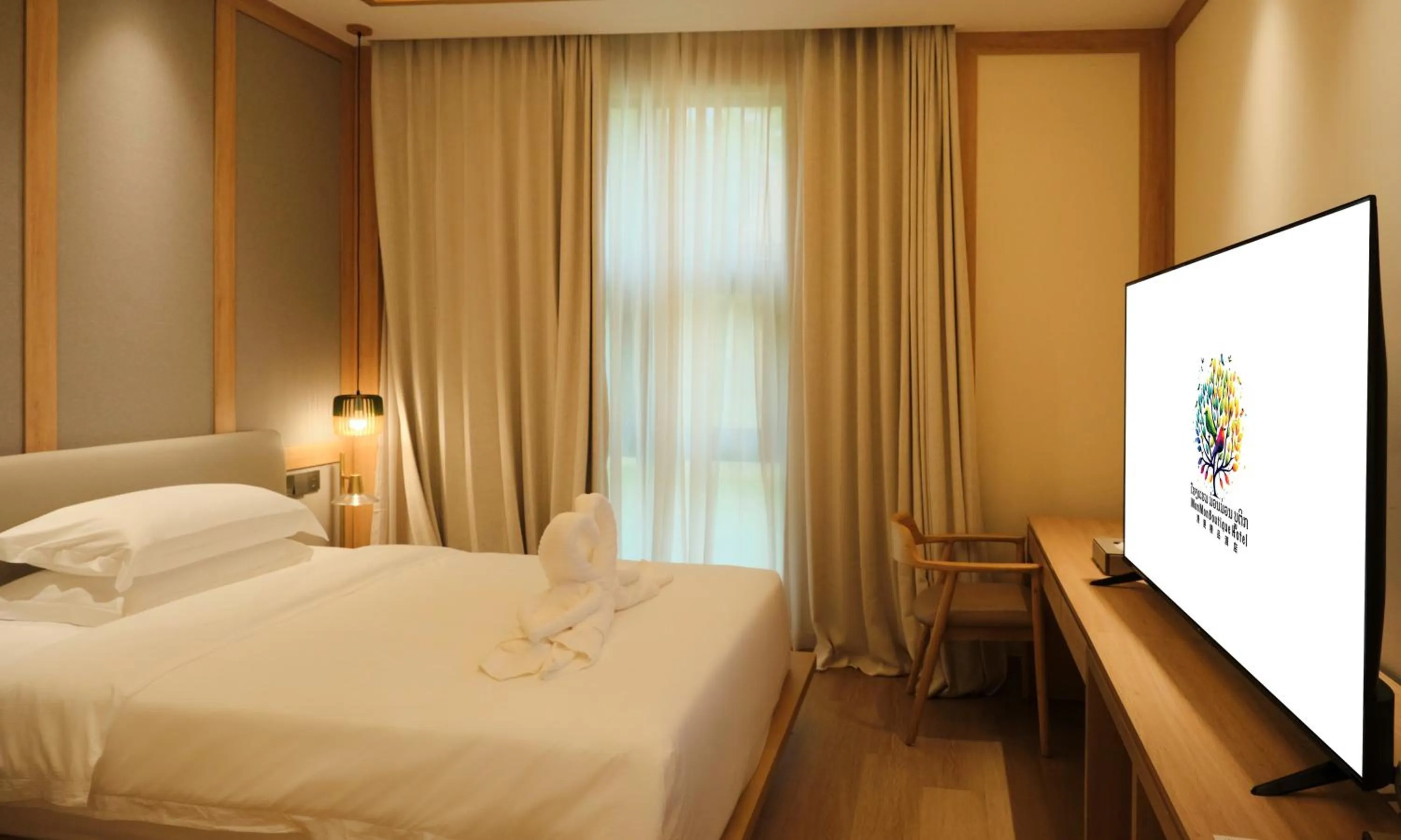 Bed in MonMonBoutique Hotel