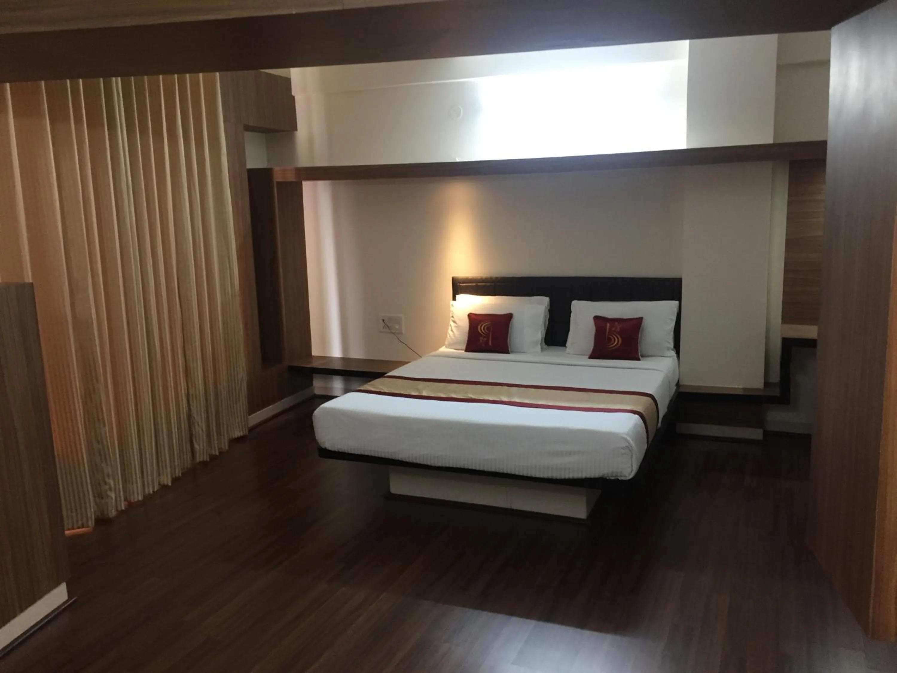 Bed in Hotel Grand Bee Bangalore