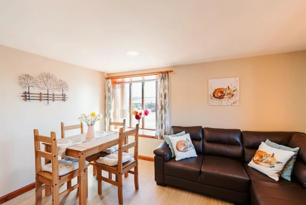 Seating area in The Stable at Clauchan Holiday Cottages