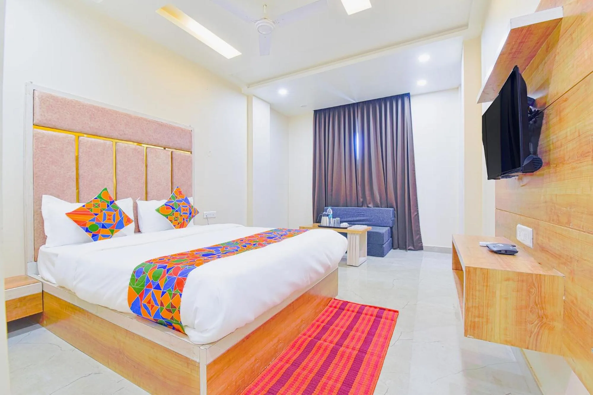 Bed in FabHotel Bohra International