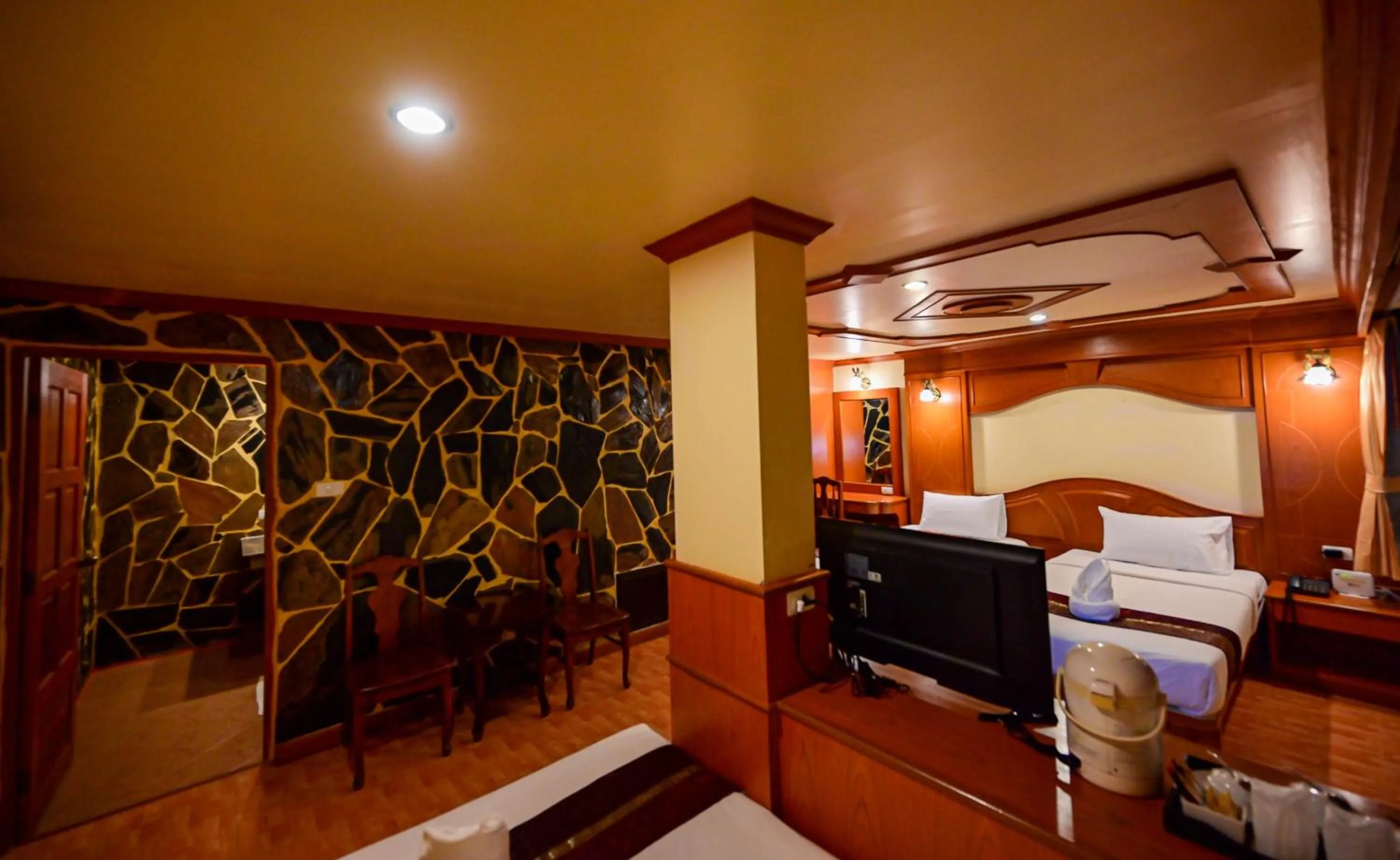 Bed in Tiger Complex Hotel