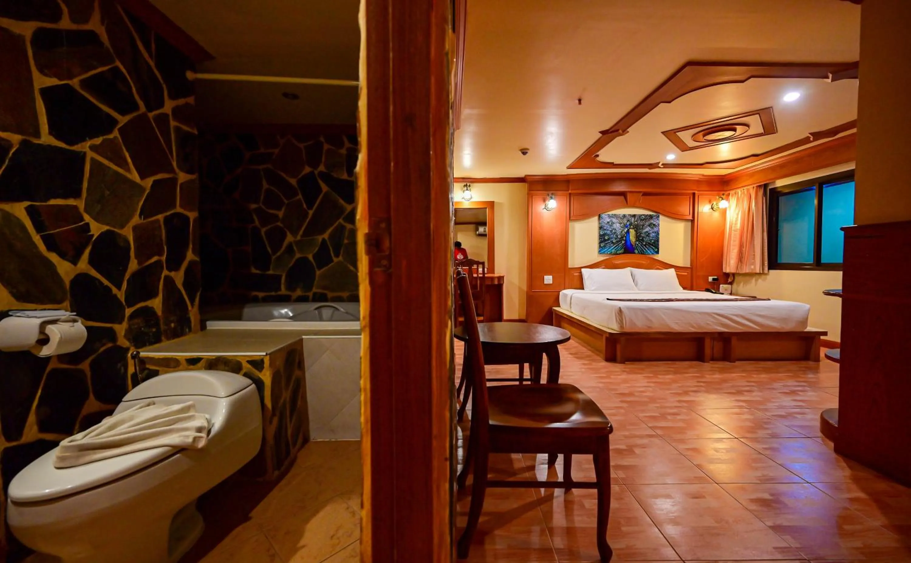 Bed in Tiger Complex Hotel