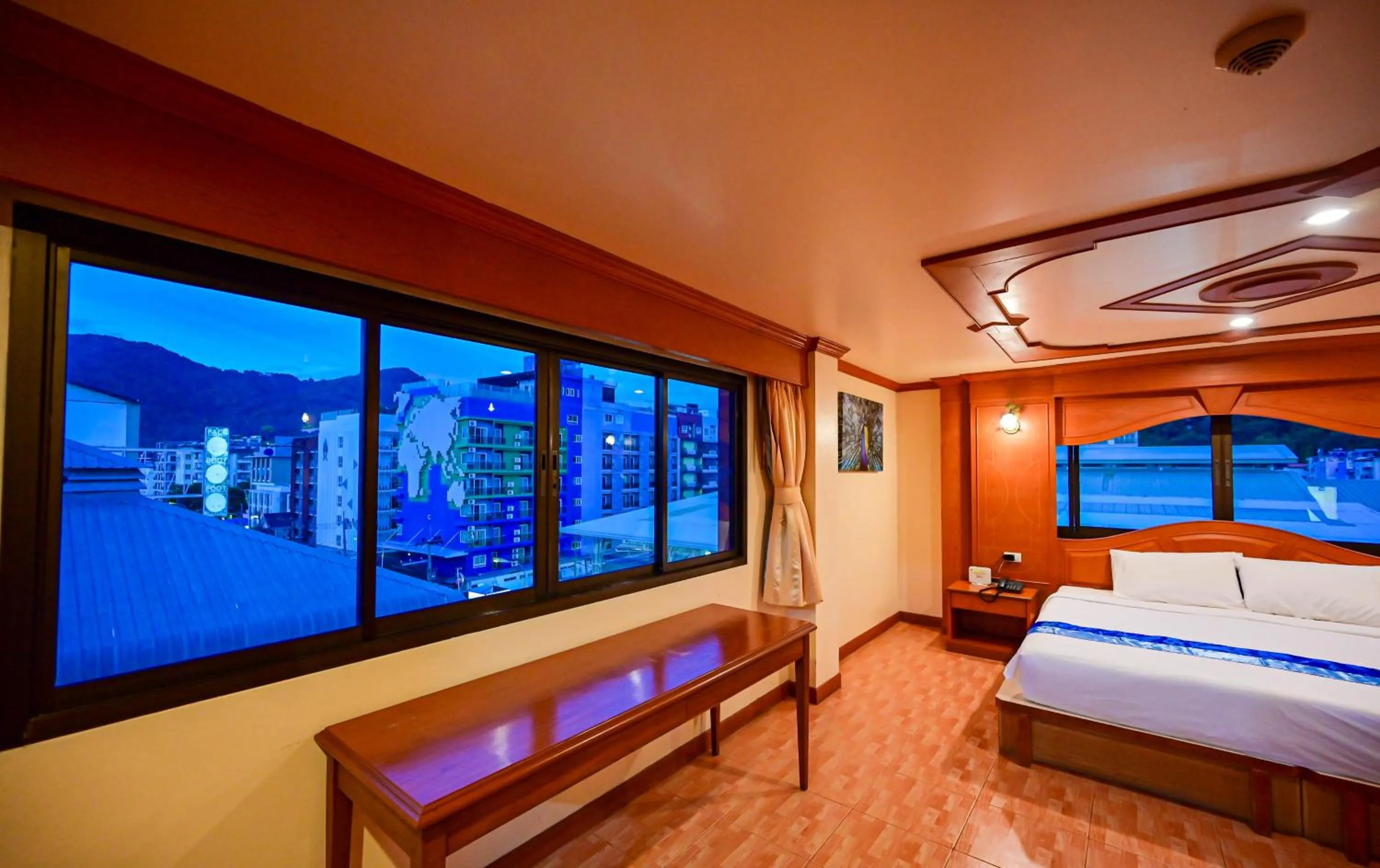 Bed in Tiger Complex Hotel