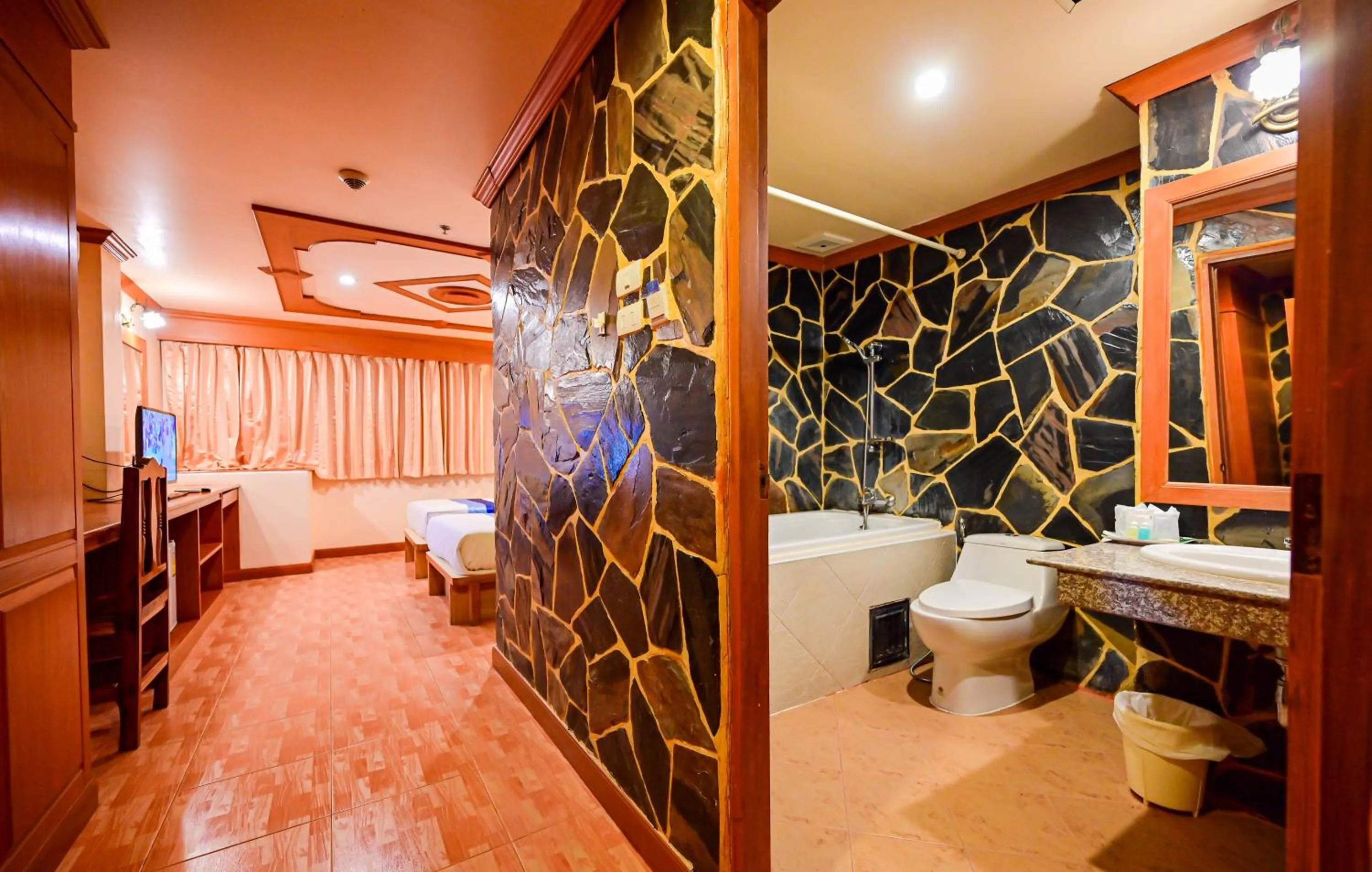 Bedroom in Tiger Complex Hotel