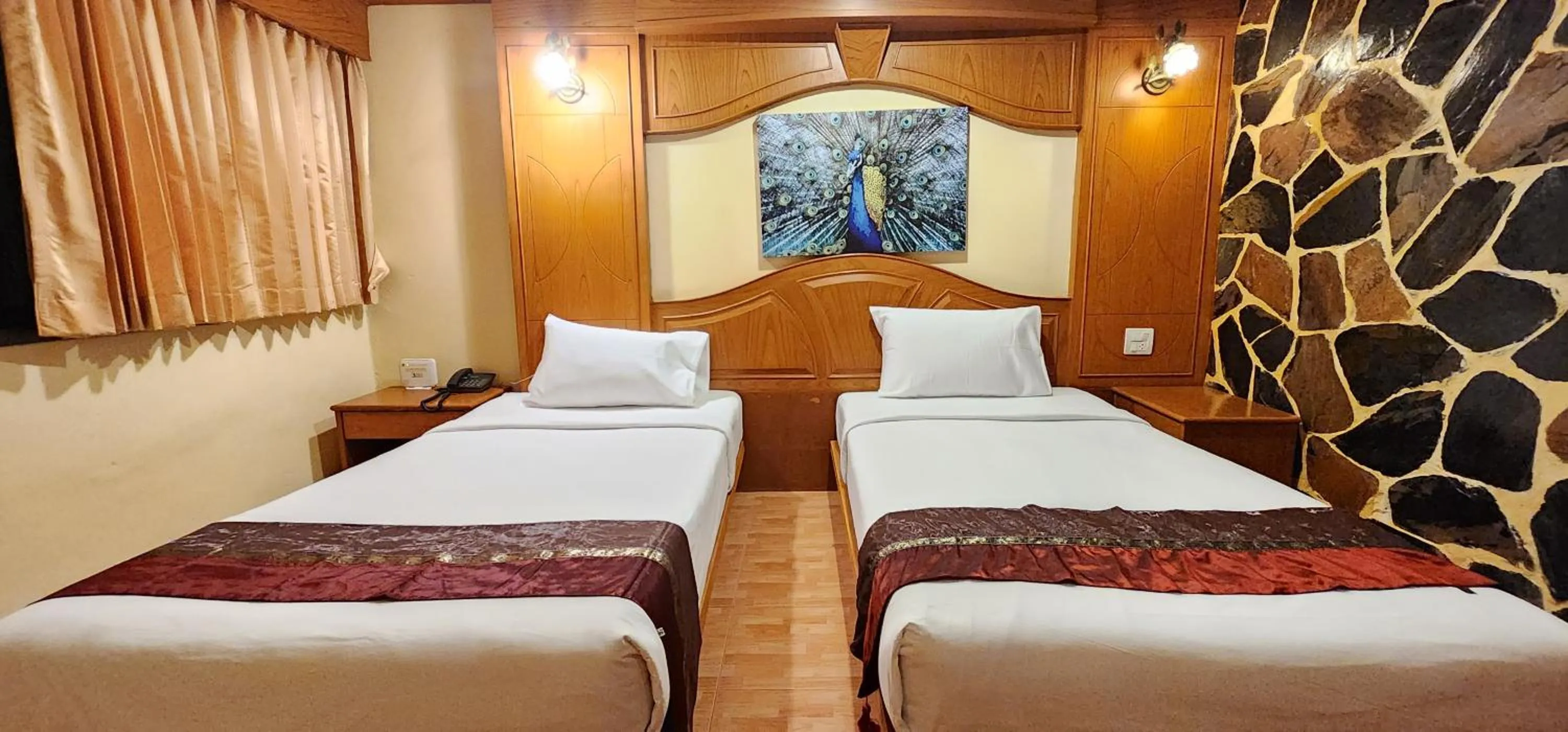 Bed in Tiger Complex Hotel