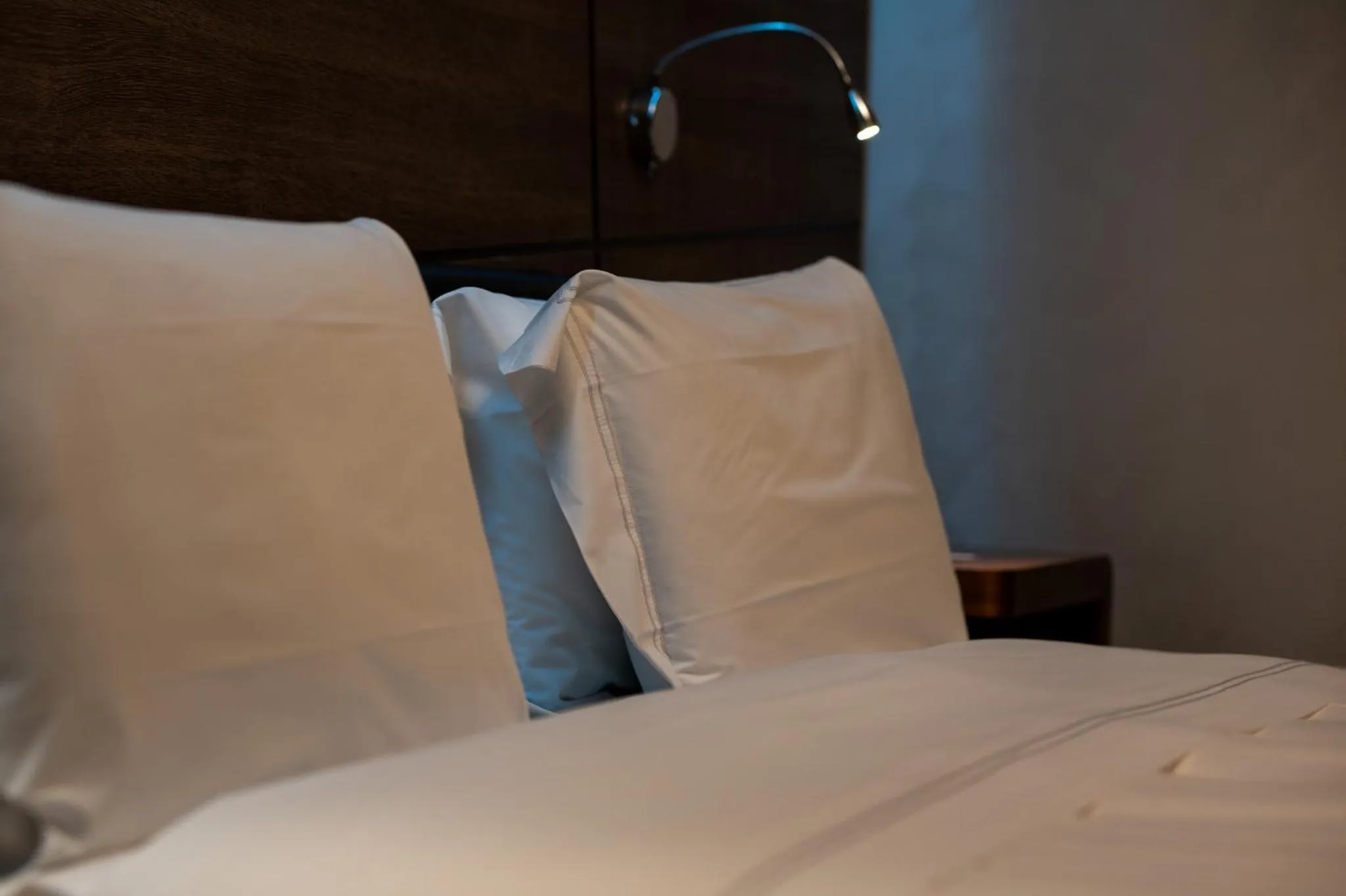 Bed in Divina Luxury Hotel