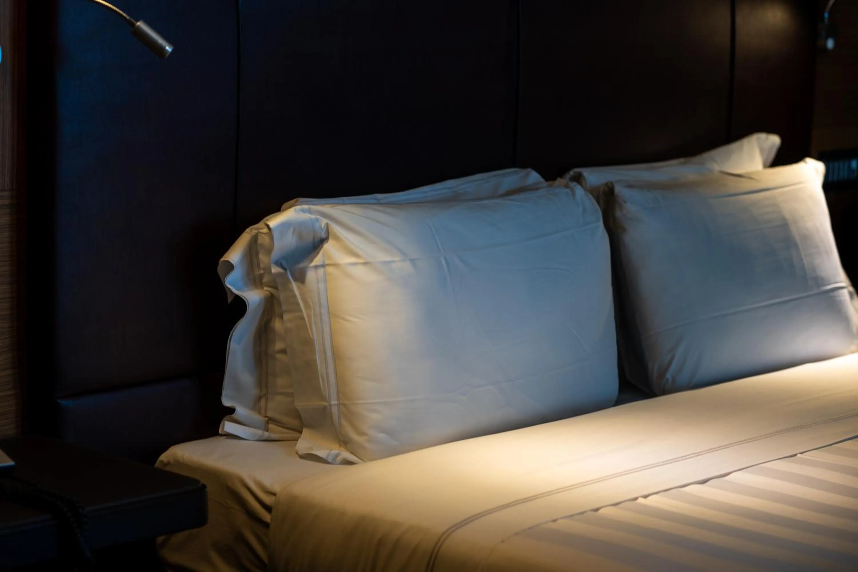 Bed in Divina Luxury Hotel