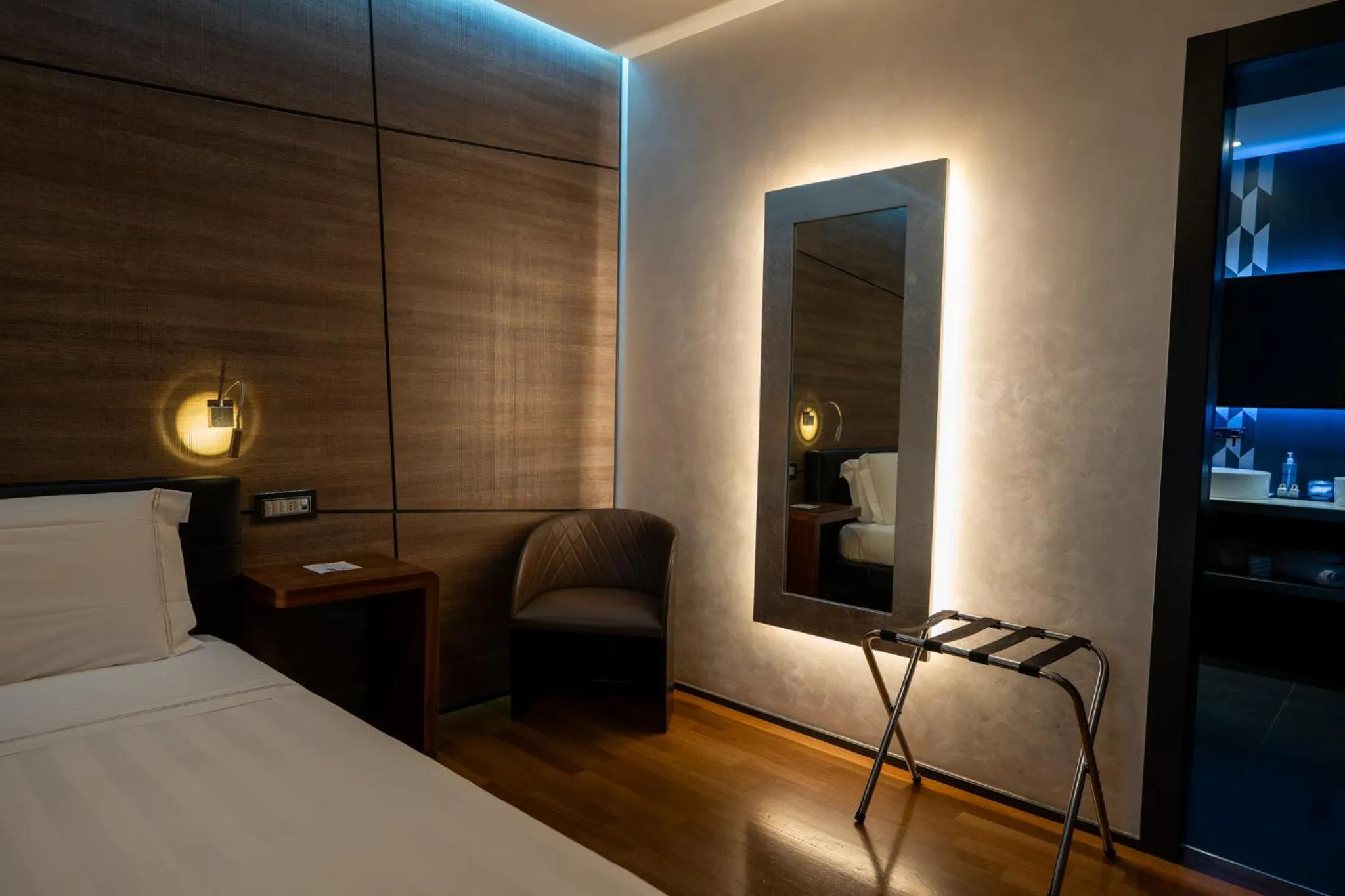 Bed in Divina Luxury Hotel