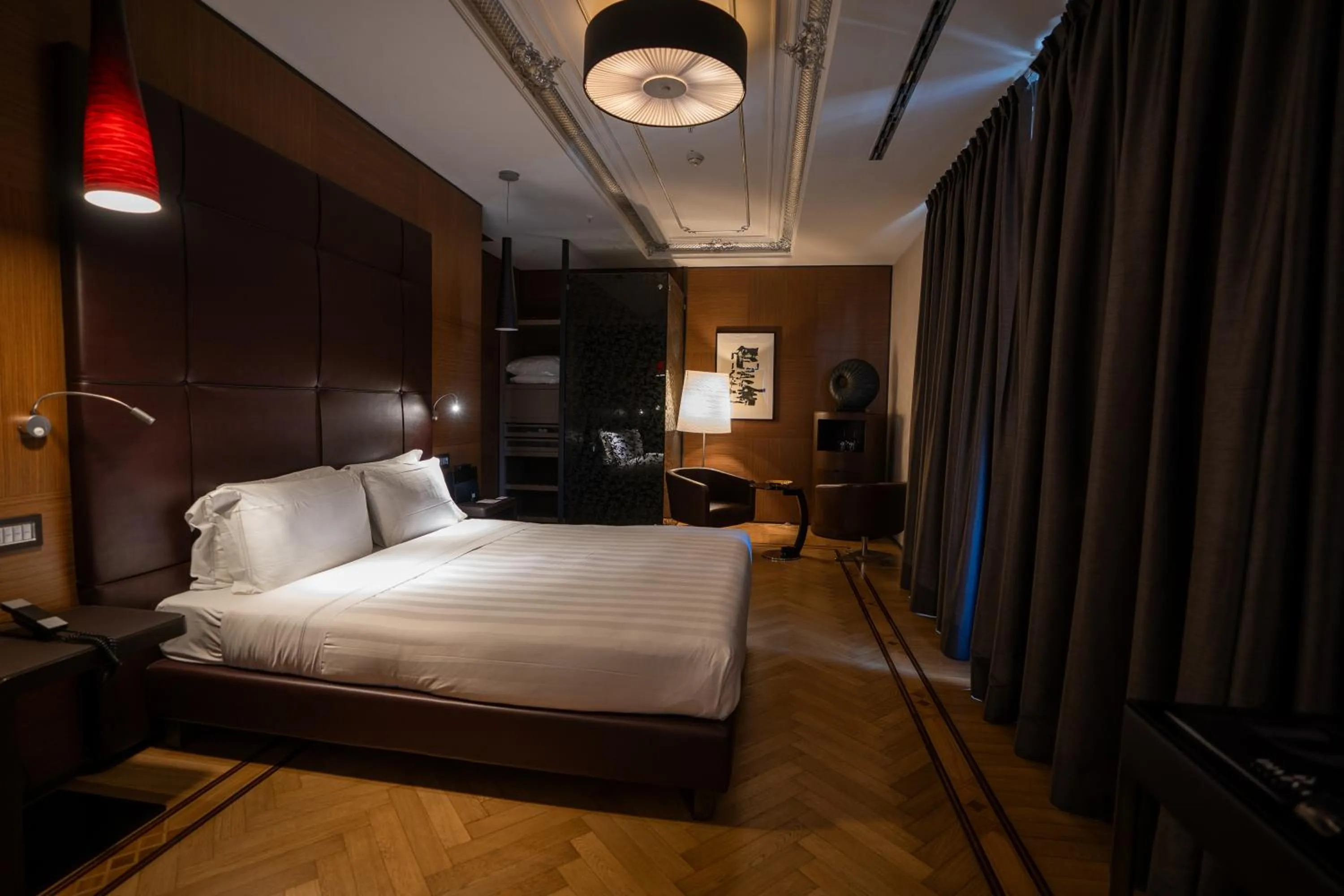 Bed in Divina Luxury Hotel