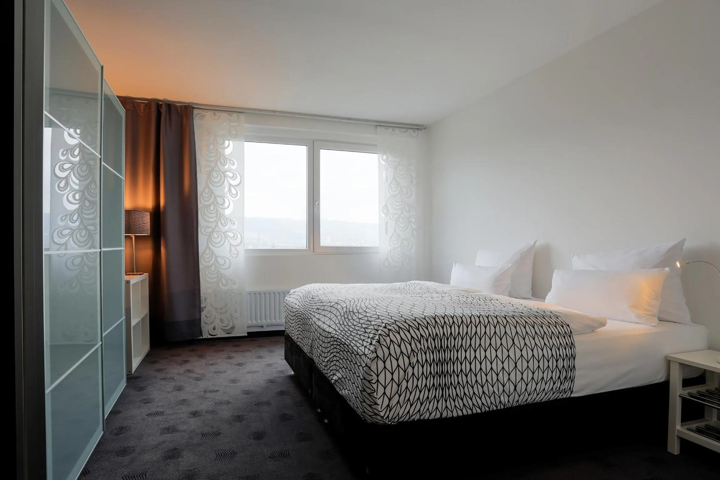 Photo of the whole room, Bed in FourSide Plaza Hotel Trier, Trademark Collection by Wyndham