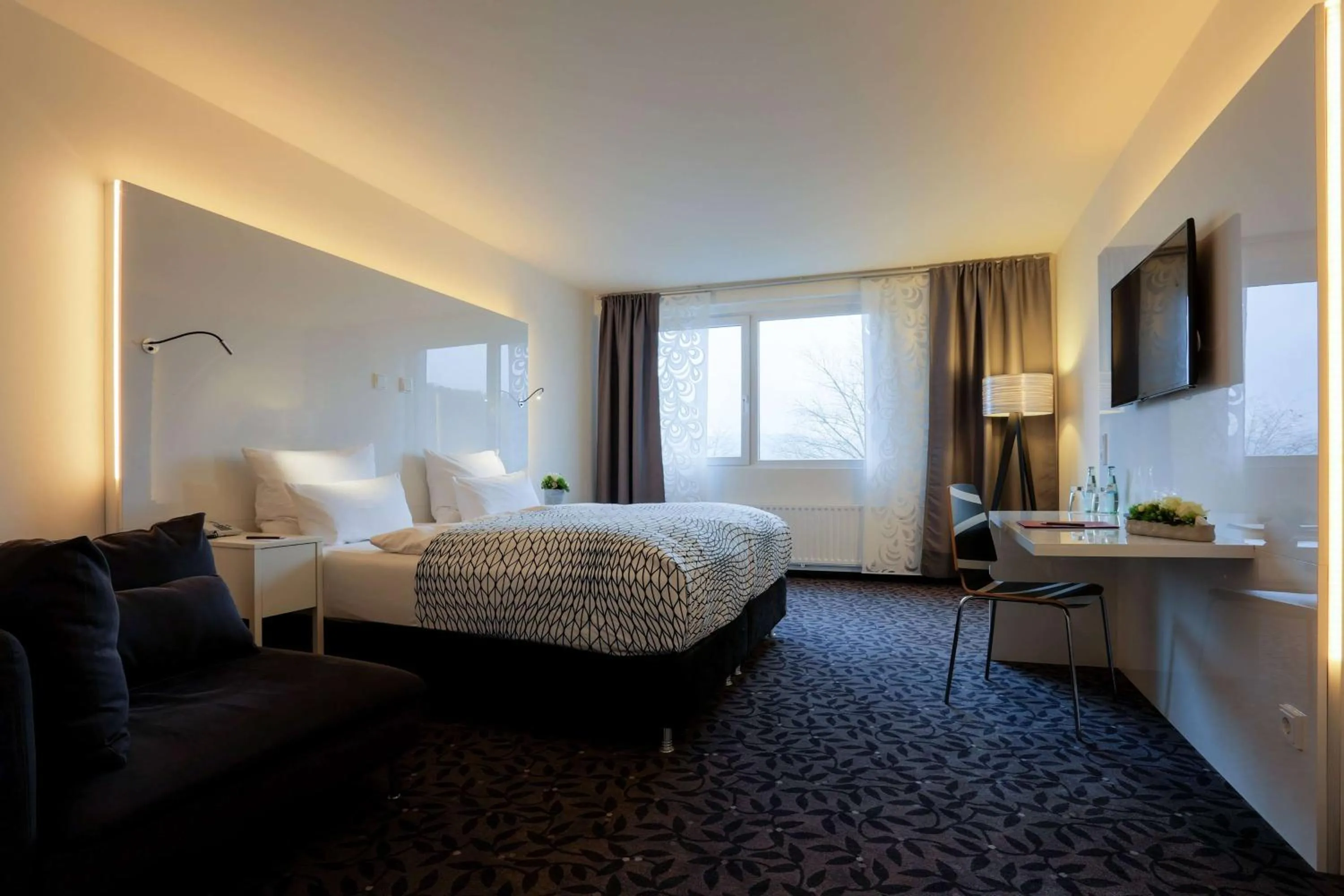 Photo of the whole room, Bed in FourSide Plaza Hotel Trier, Trademark Collection by Wyndham