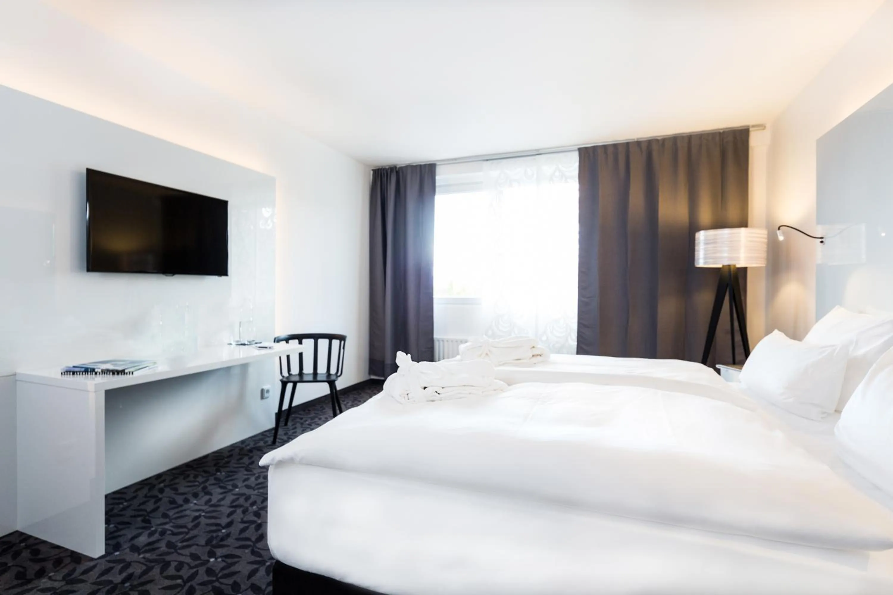 Photo of the whole room, Bed in FourSide Plaza Hotel Trier, Trademark Collection by Wyndham