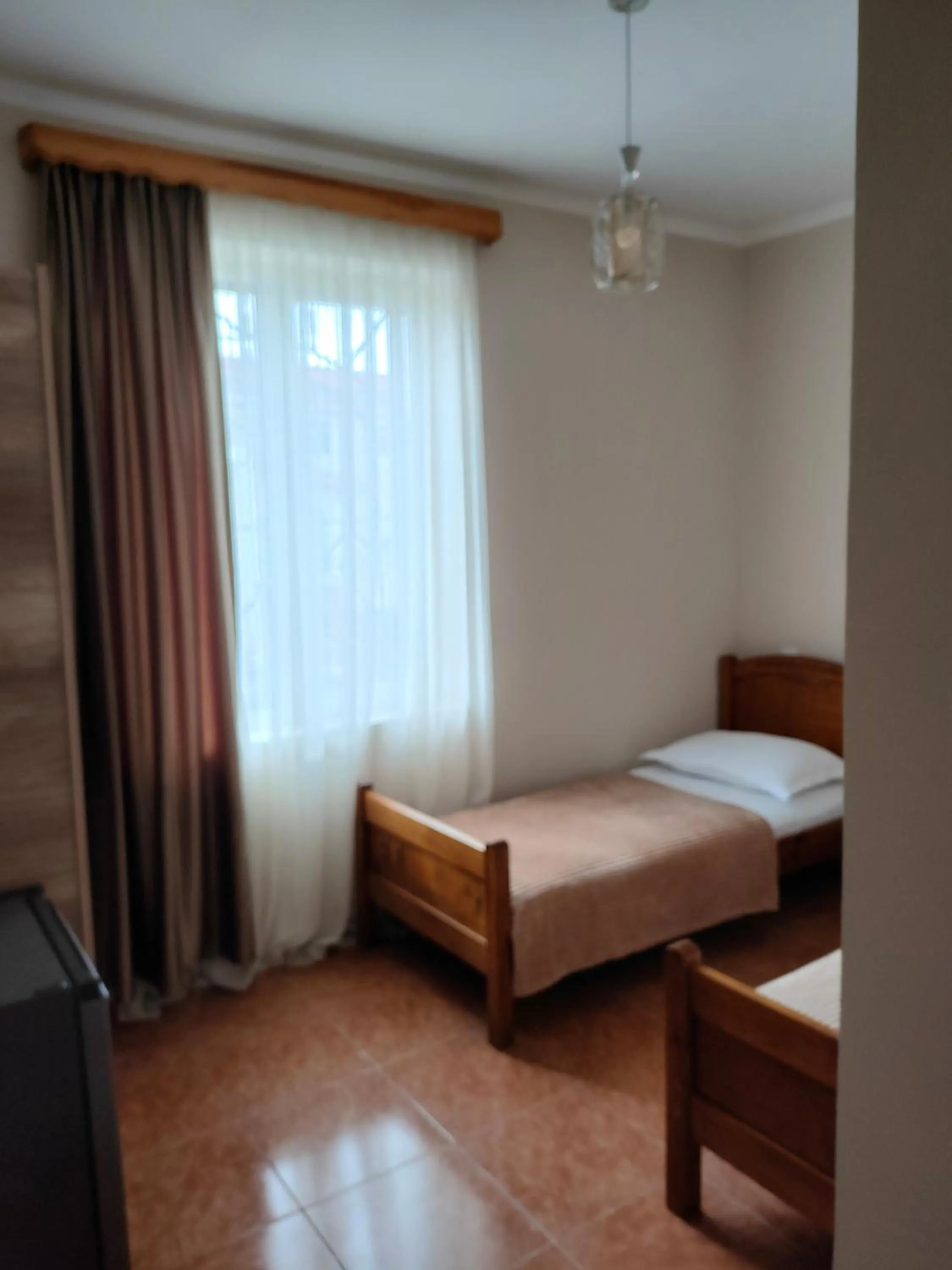 Bed in Tornado Hotel