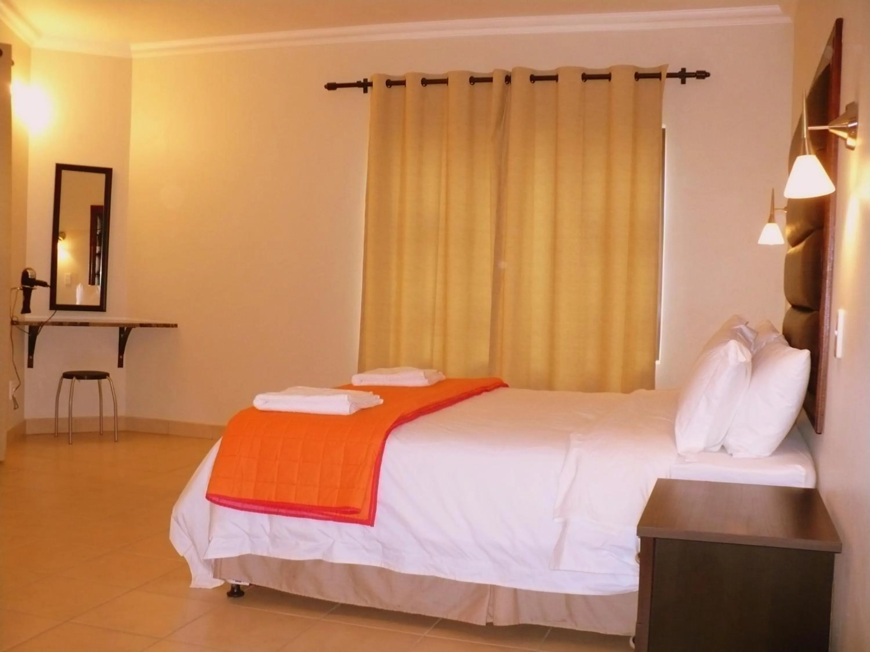 Bed in Palm Valley Inn And Day Spa