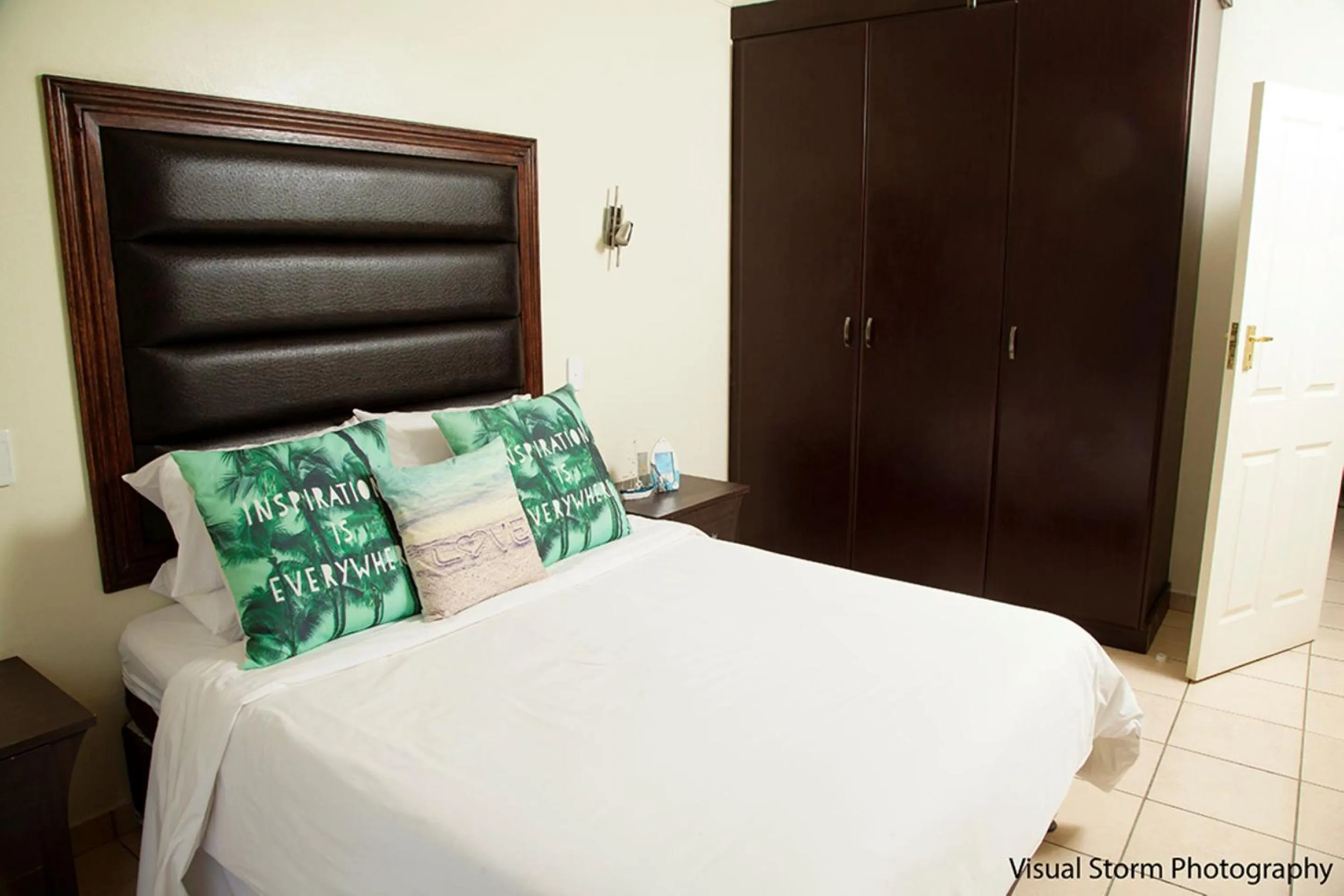 Bed in Palm Valley Inn And Day Spa