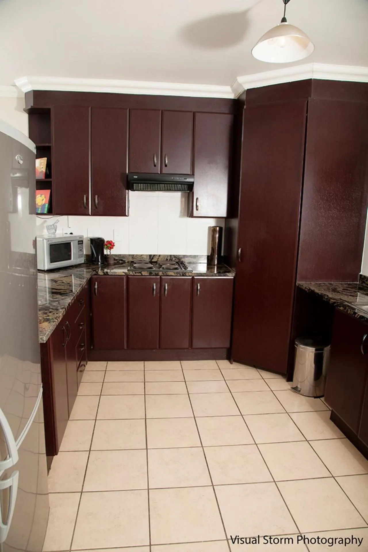 kitchen in Palm Valley Inn And Day Spa